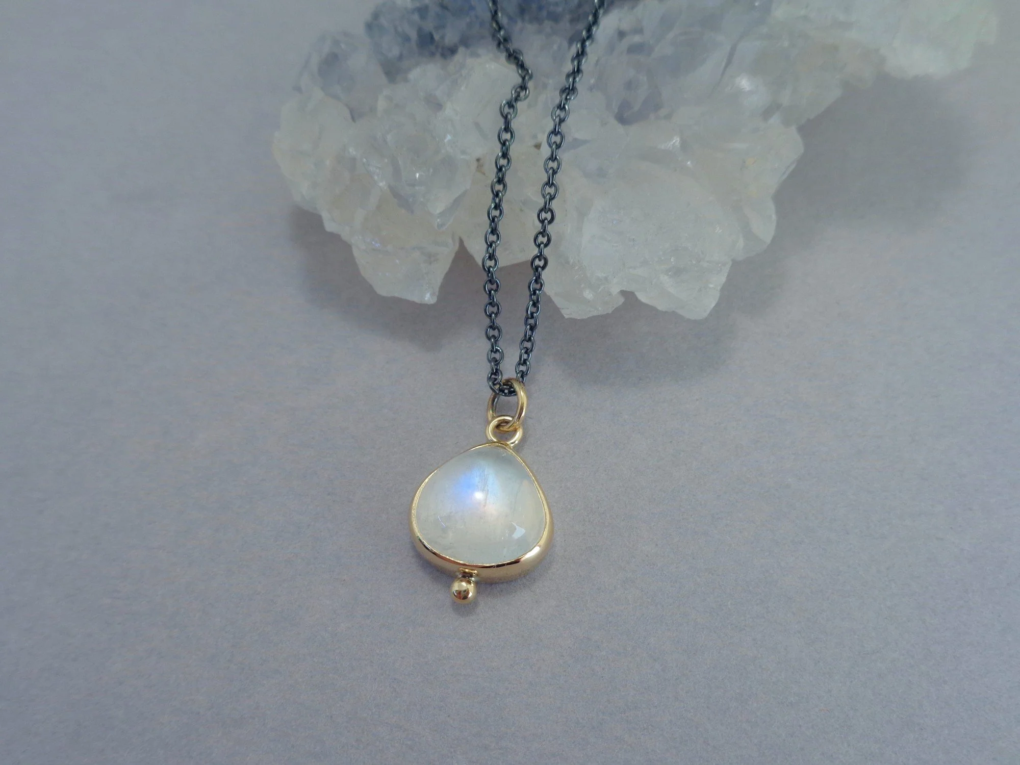 18k gold pendant with moonstone x.jpg