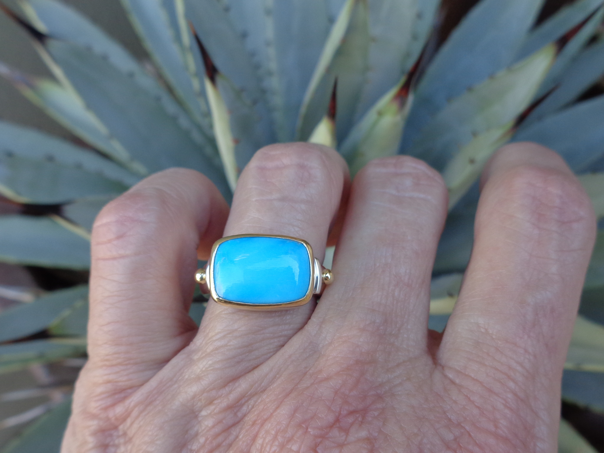 mixed metal ring with SB turquoise x.png