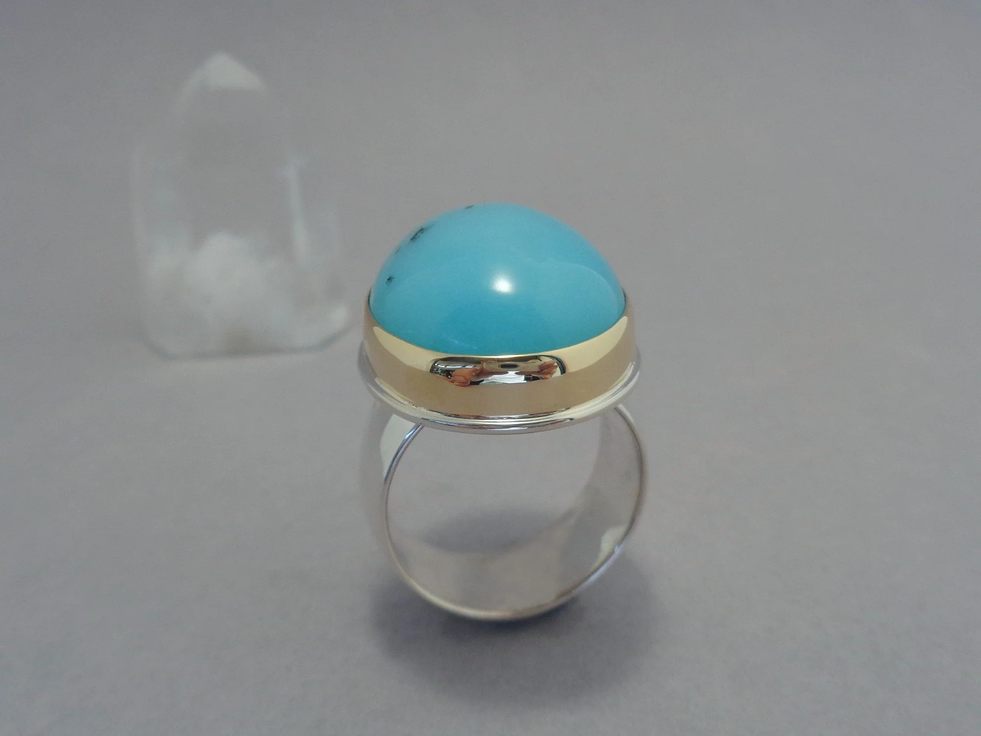 gold and silver ring with blue opal x.jpg