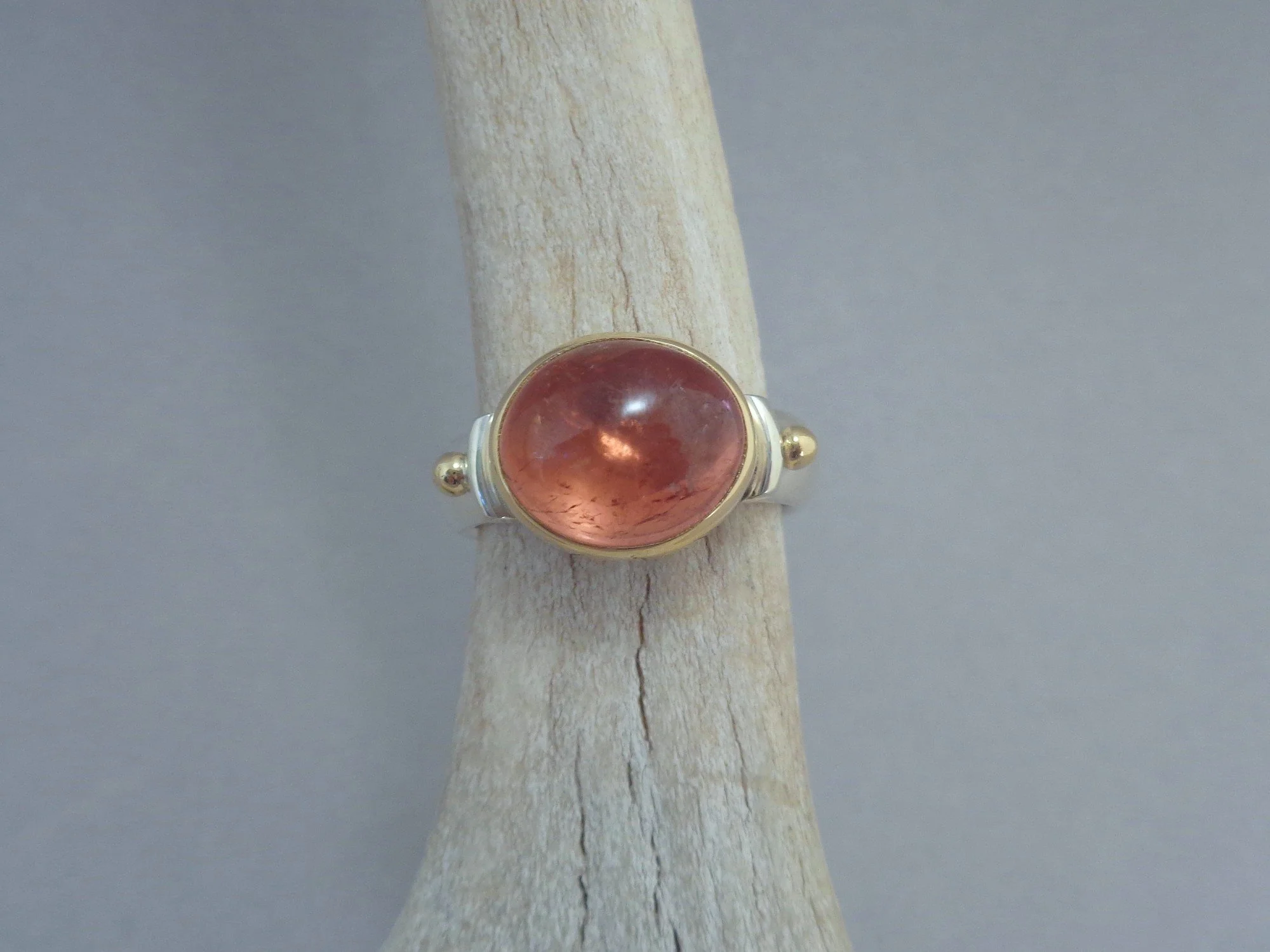glowing peach tourmaline ring x.jpg