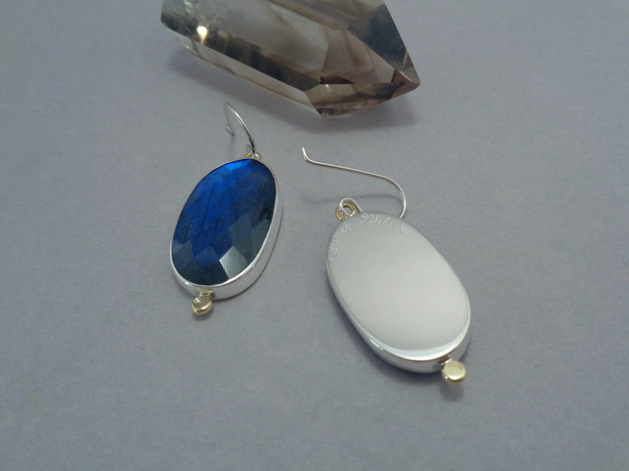 silver and gold earrings with labradorite x.jpg
