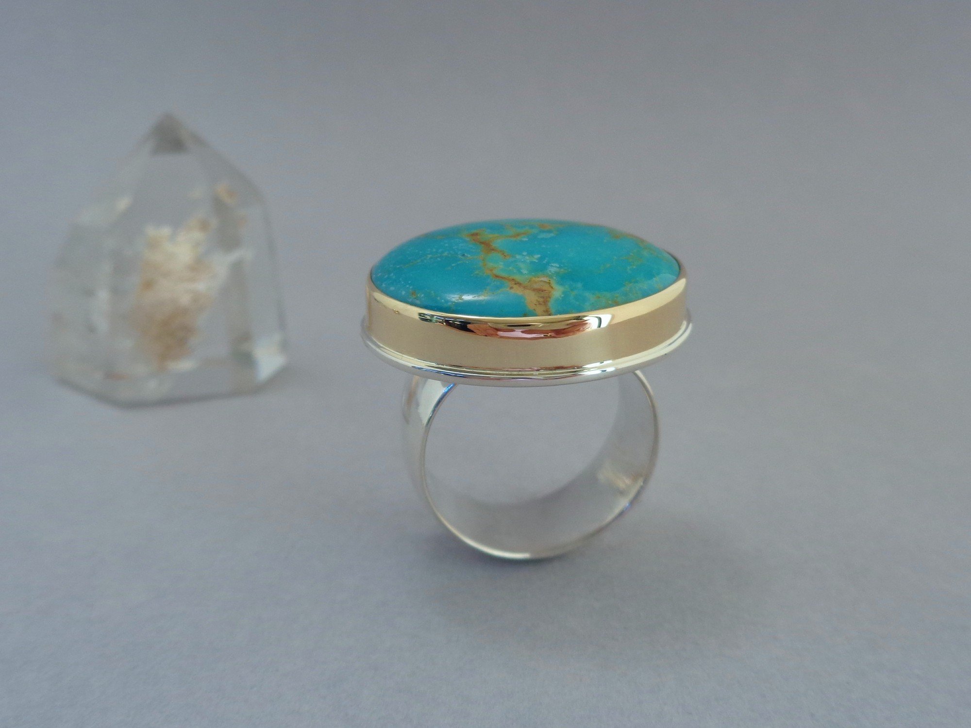 gold and silver ring with large turquoise stone x.jpg