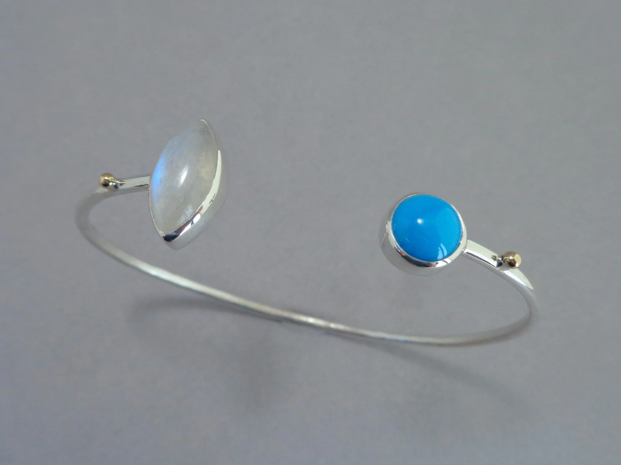 rainbow moonstone and turquoise cuff x.jpg
