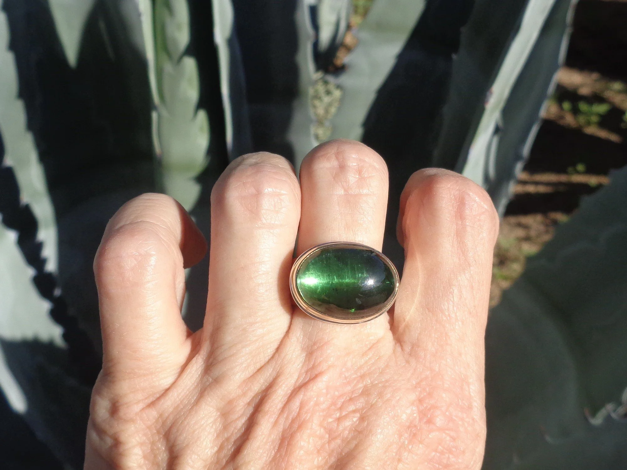 glowing green tourmaline ring x.jpg