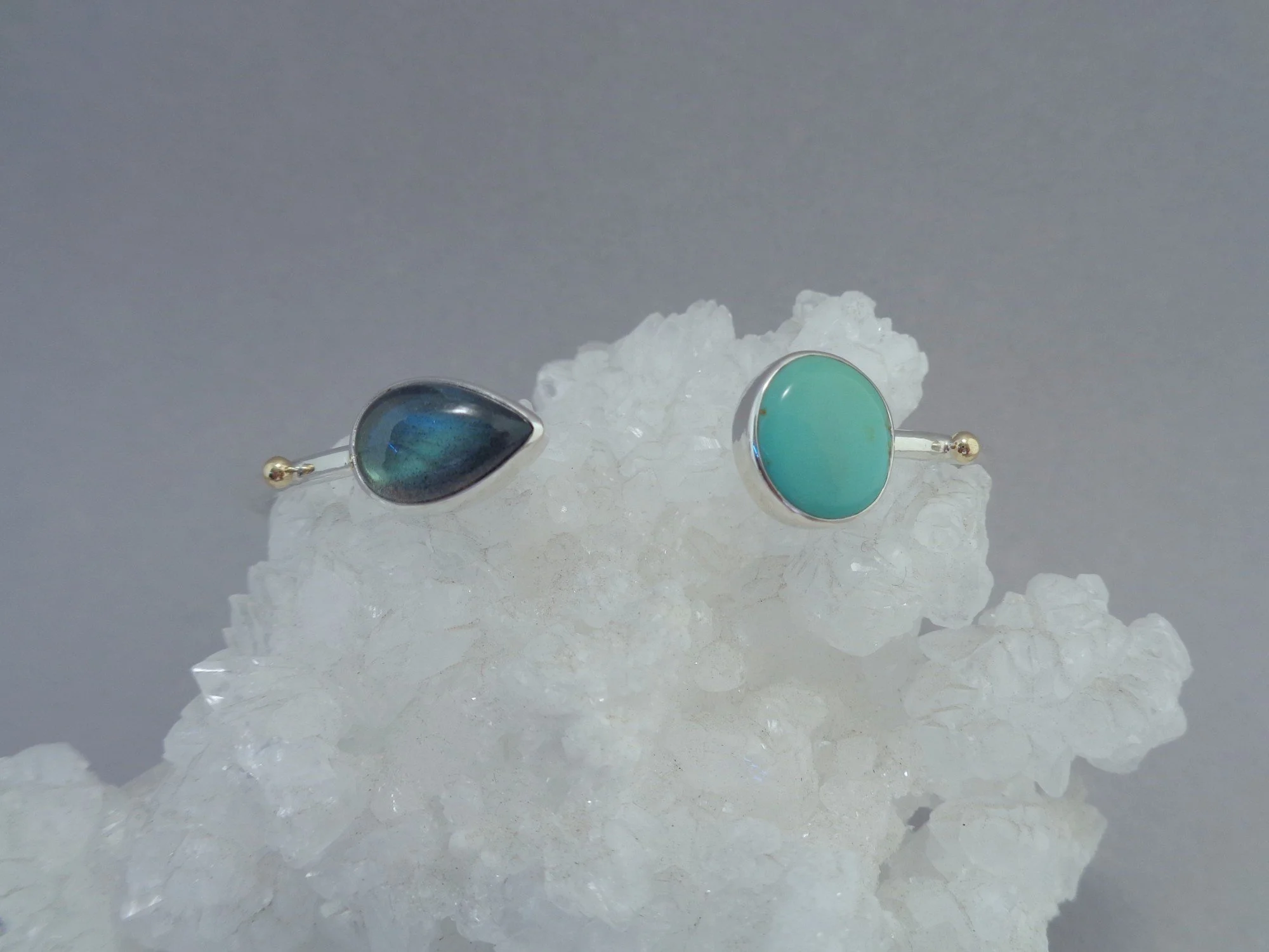 cuff bracelet with green stones x.jpg