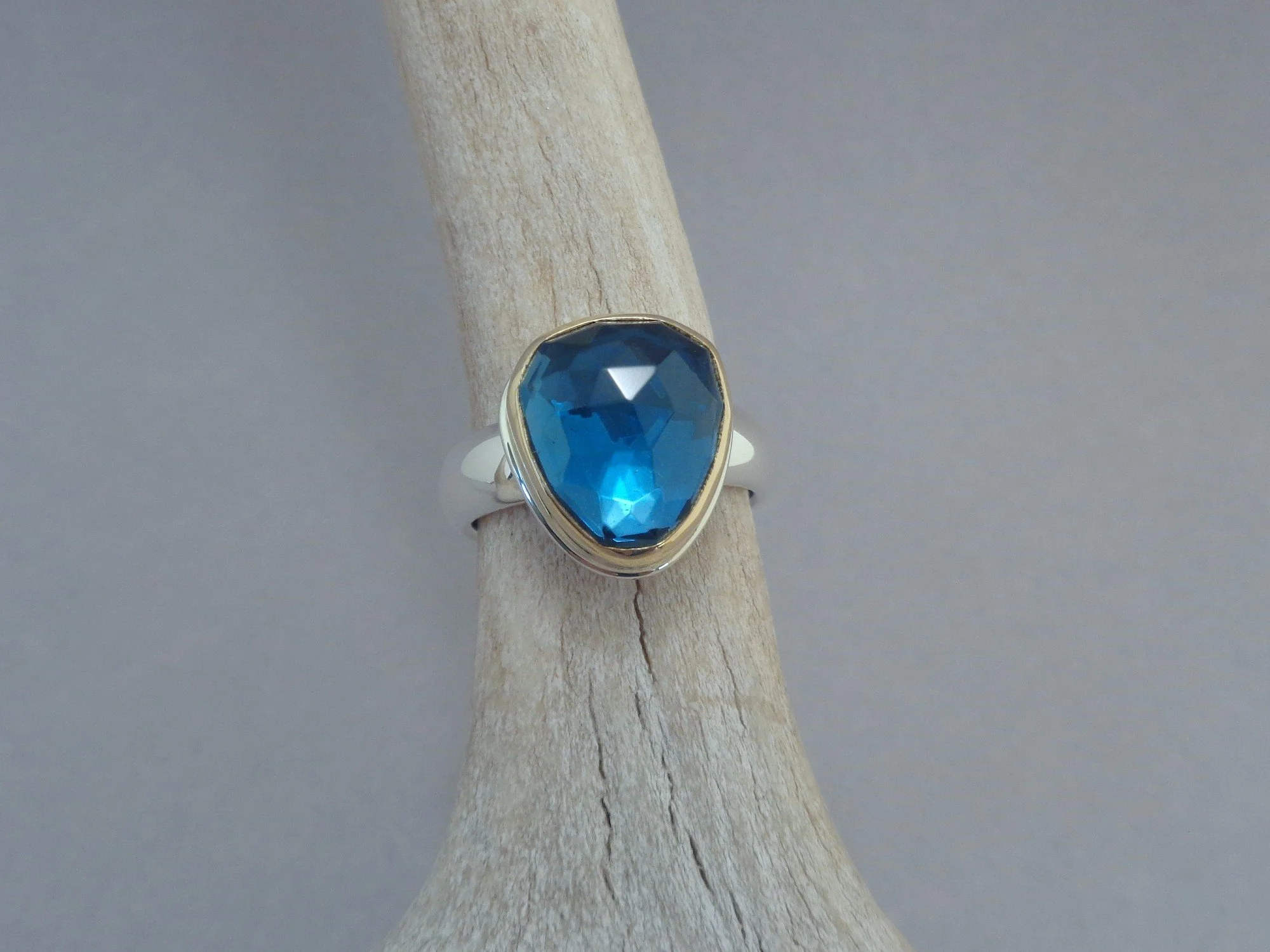 triangular blue topaz ring x.jpg