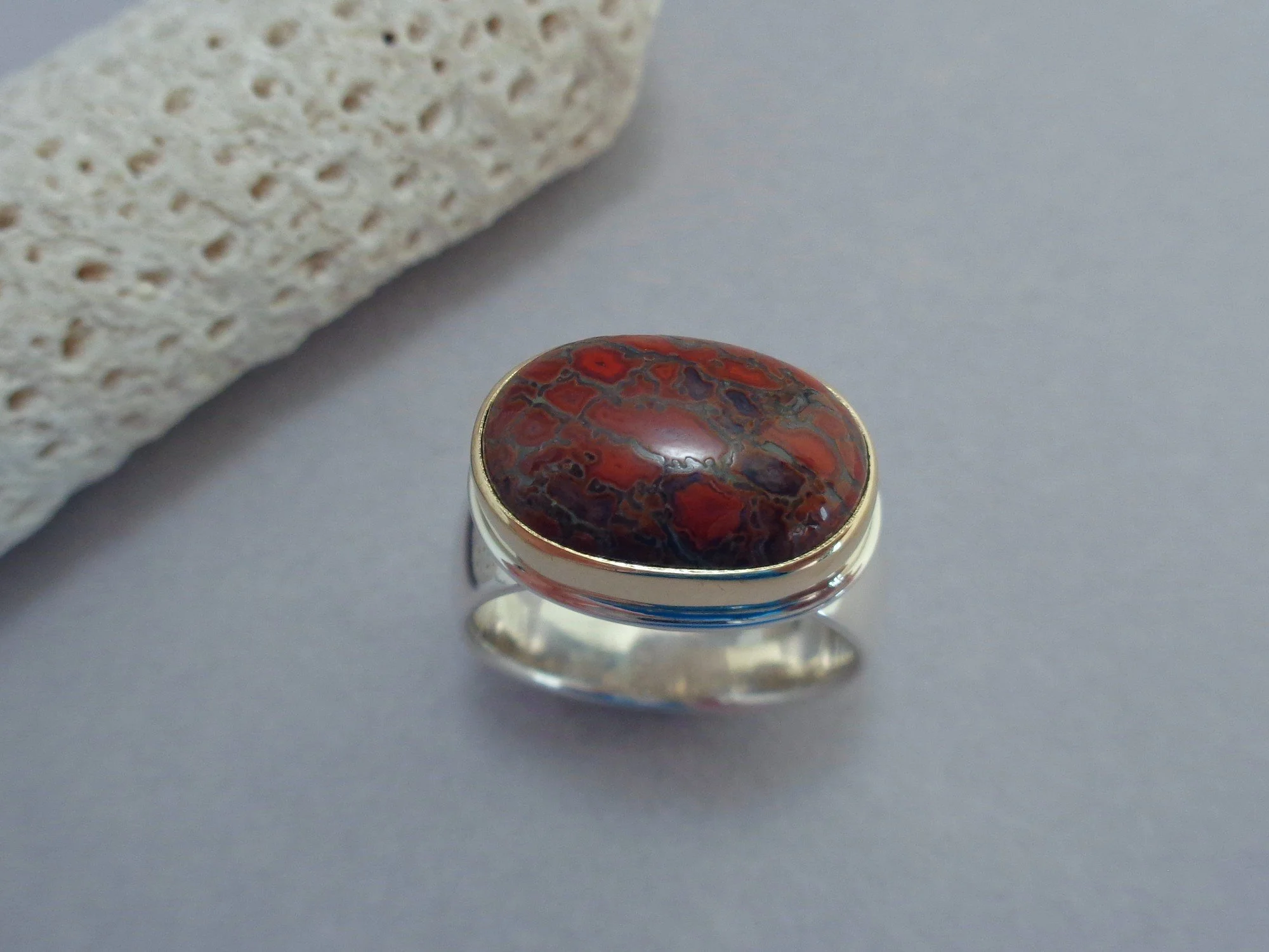 red dinosaur bone ring x.jpg