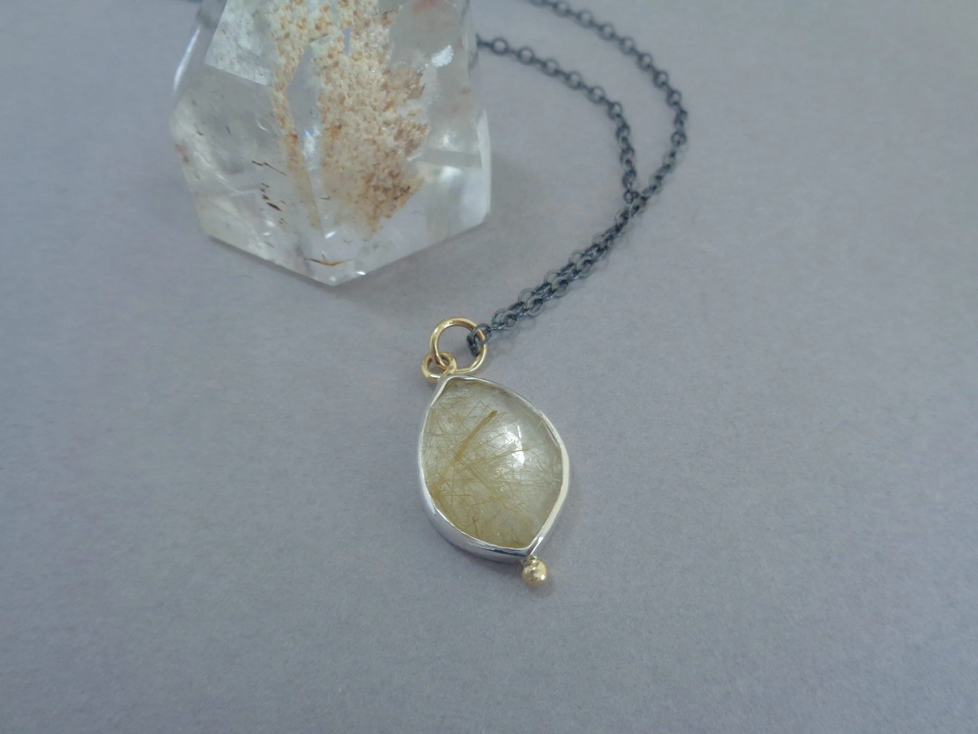 pendant in silver and gold with rutilated quartz x.jpg