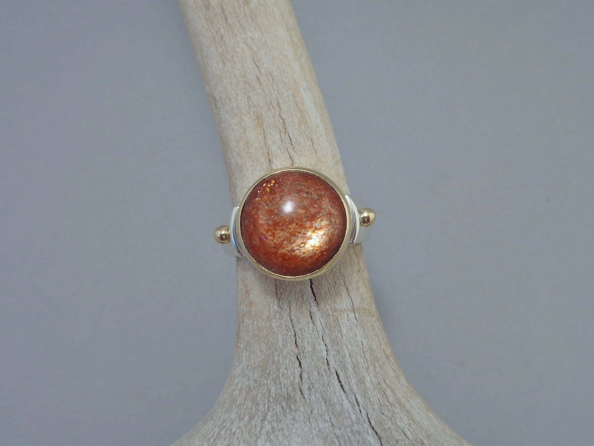 sunstone ring in 18k gold and sterling x.jpg