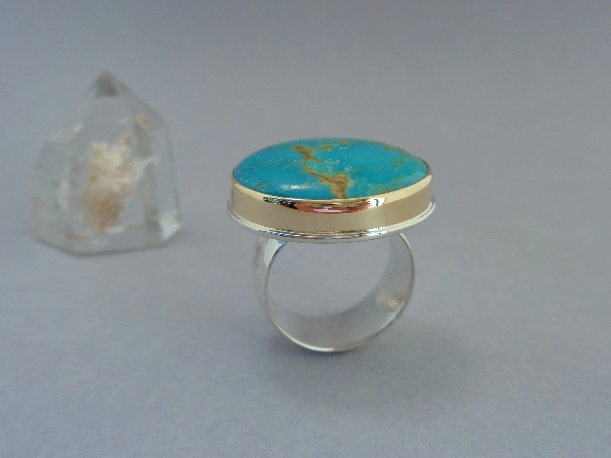 gold and silver ring with large turquoise stone x.jpg