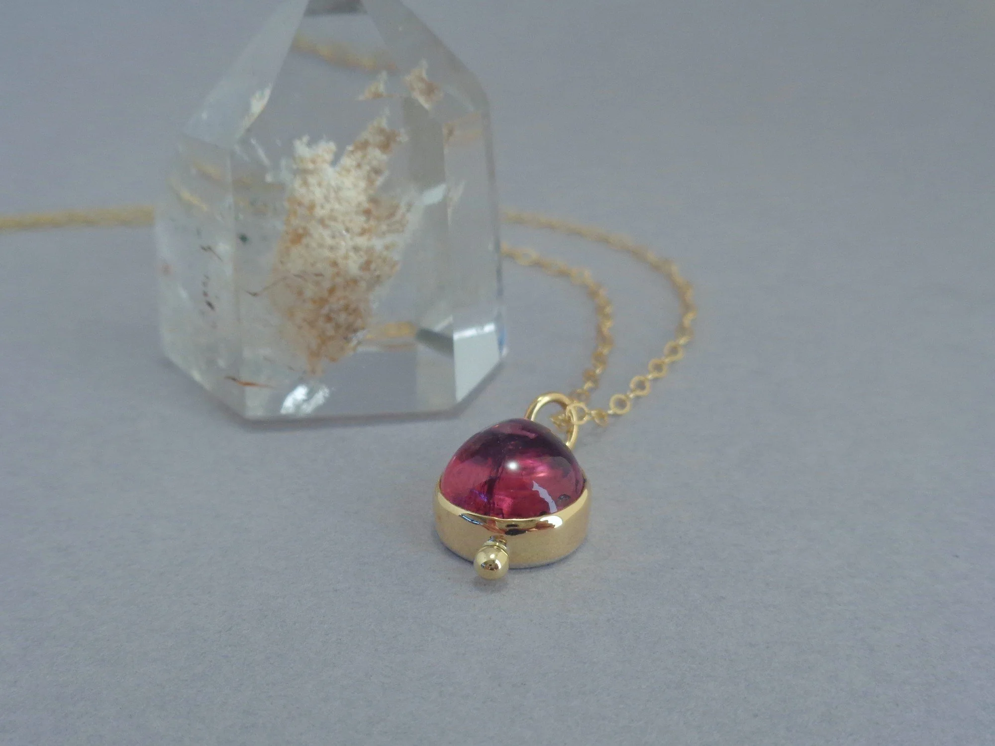 pink tourmaline in gold pendant x.jpg