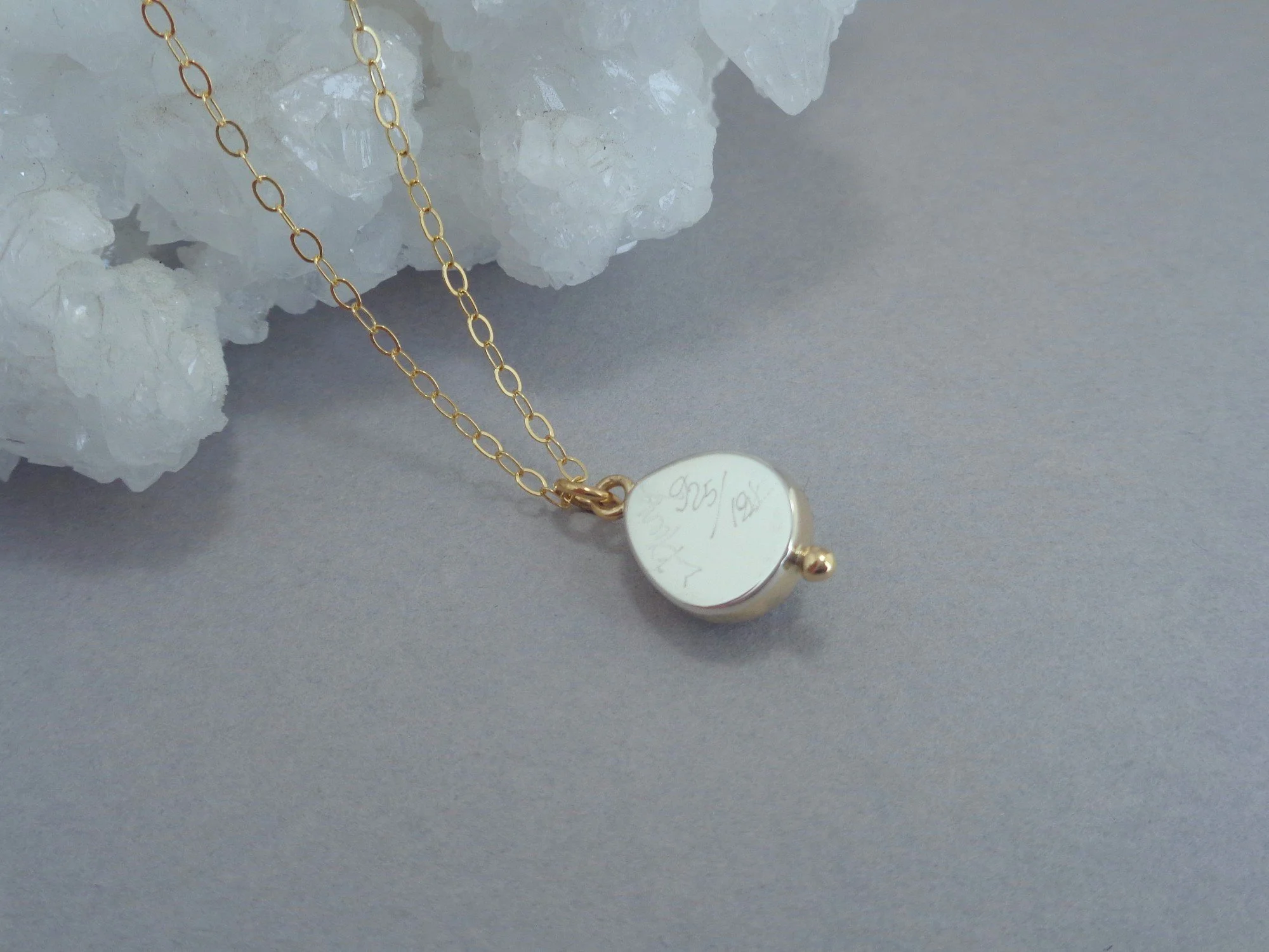 silver and gold pendant x.jpg