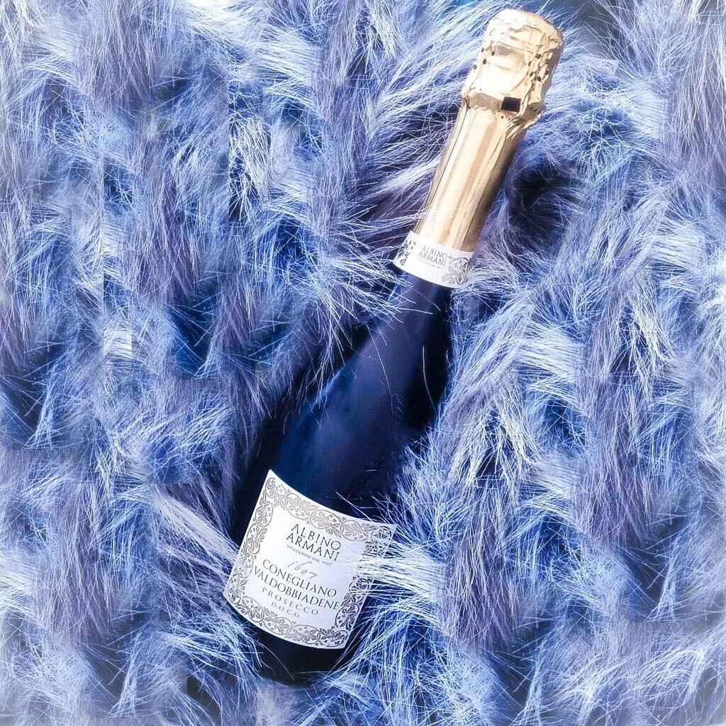 When you can&rsquo;t afford champagne and chinchilla, there&rsquo;s always Prosecco and Puppy fur ( no worries animal lovers! It&rsquo;s all faux). No animals were harmed. 

 Bubbles that Finesse! This D.O.C.G Prosecco  from albino Armani is extremel