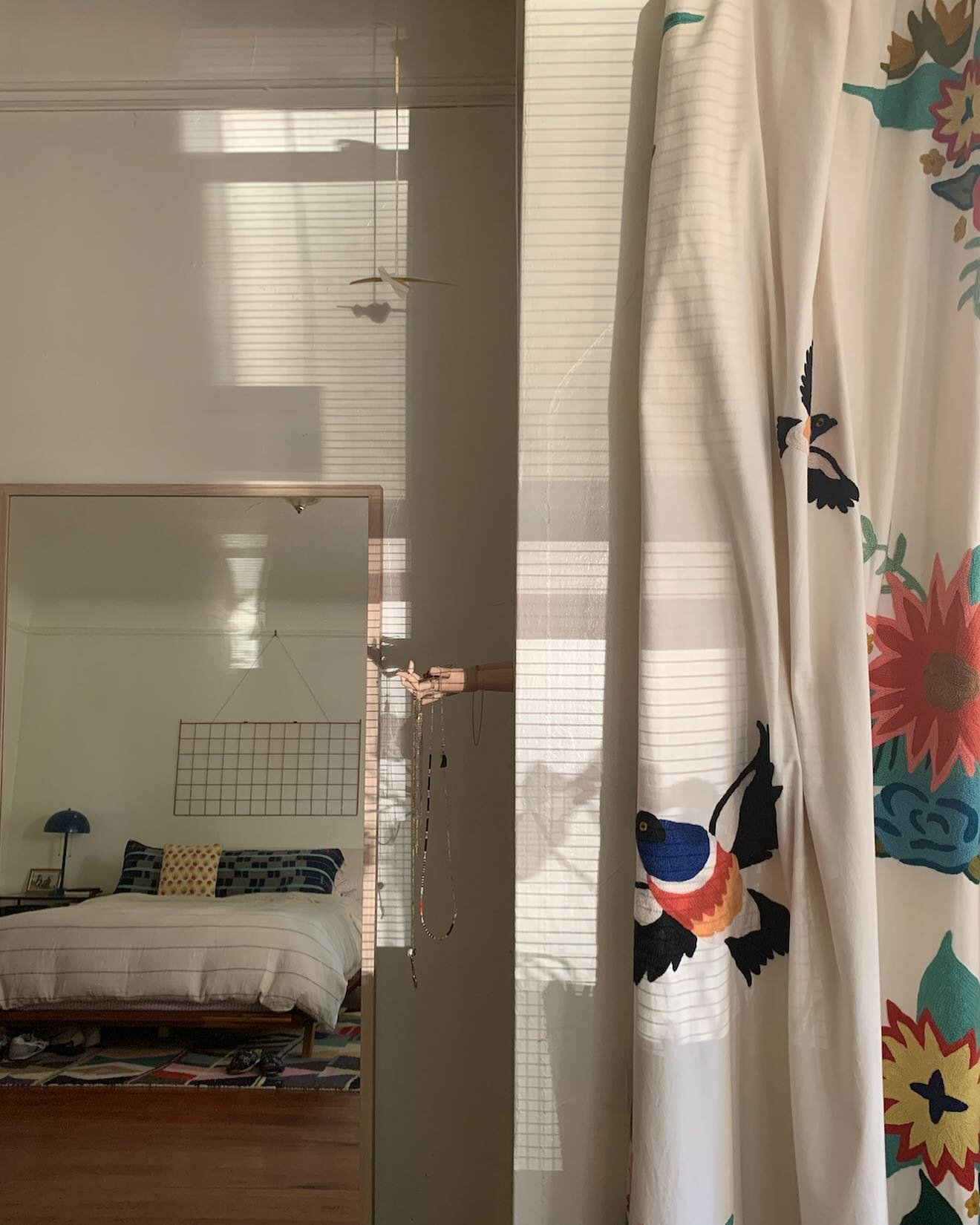 When my partner moved in, we switched around all the rooms in the apartment. The two bedrooms became our offices, the dining room became our living room, and the living room became our bedroom. I wanted to change things up so that it felt more like *