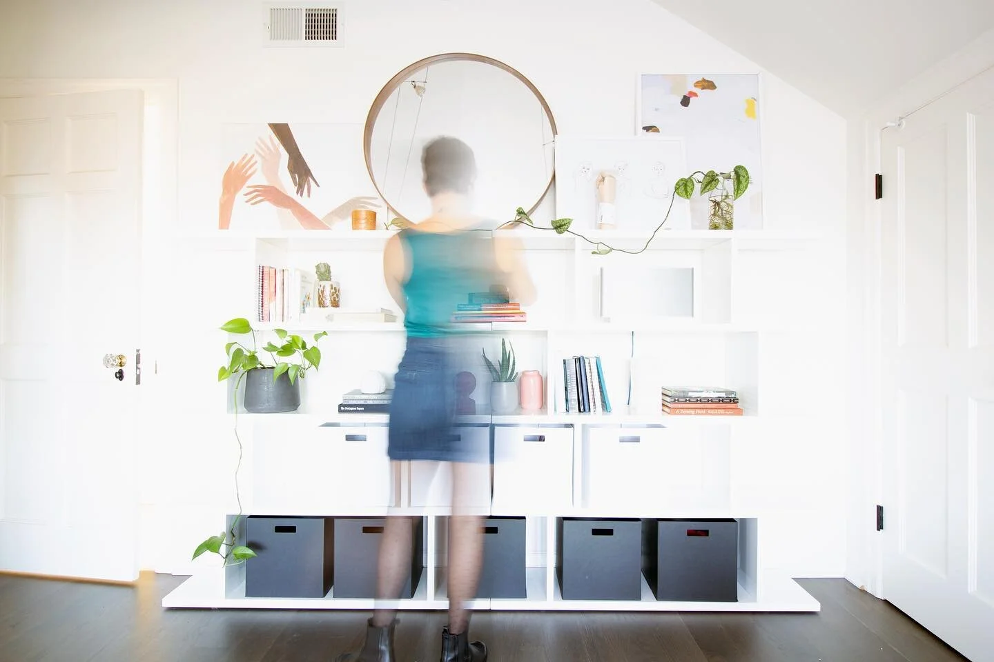 This photo of me styling a client’s shelves feels so indicative of life right now. Does anyone else feel blurred and generally over-exposed? What a year. 
I have been running around, making shit happen, and learning lots. And I am so grateful t