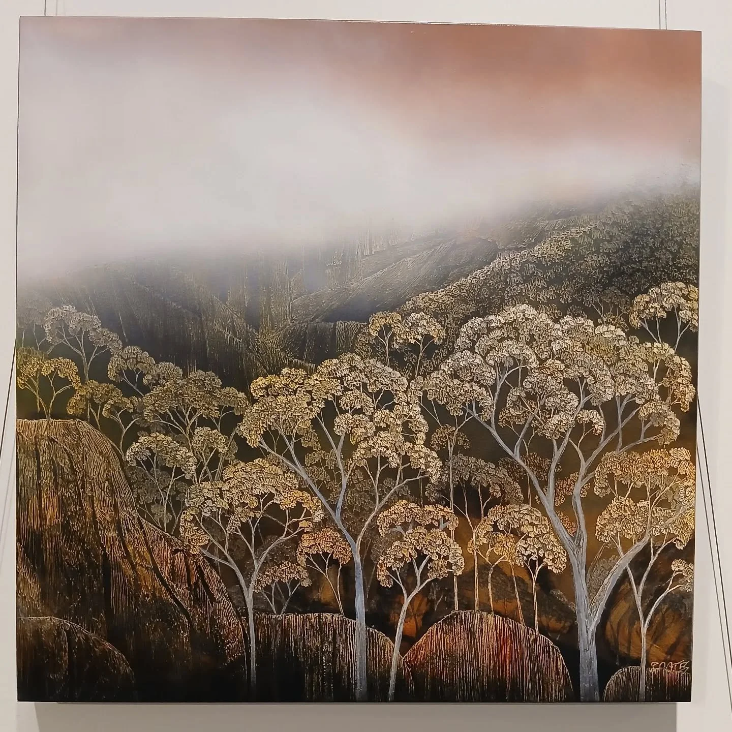 This lovely contemporary Australian landscape is by Penelope Oates. She lives and works from her rural property in the Hawkesbury. Penelope achieves her unique finish by using a soldering iron to burn into the painted surface. This work is part of th