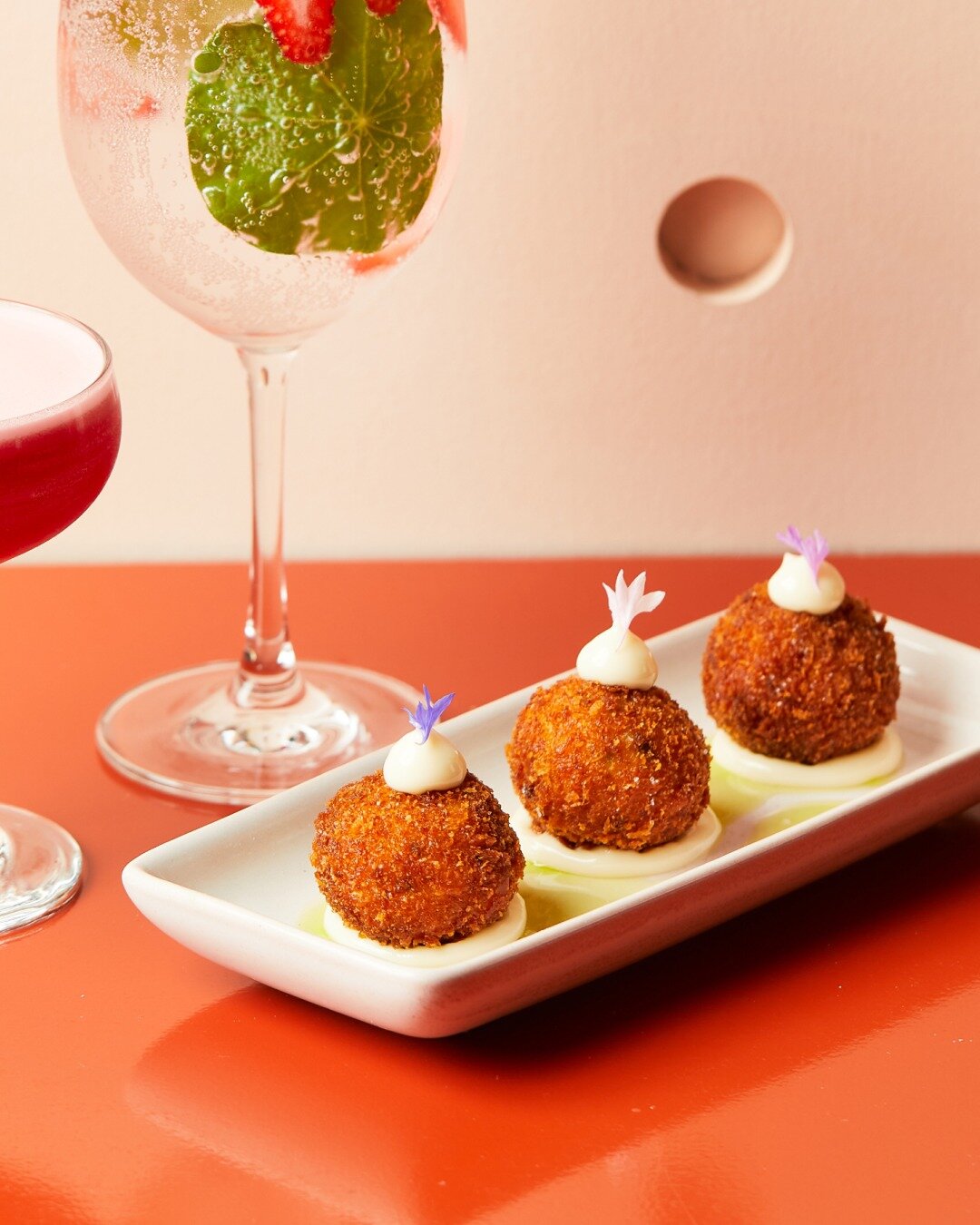 Croquettes &amp; Cocktails - an irressitable combination.  Made By Sea Snapper or Made Friendlier Plant-Based Leak. The choice is yours.