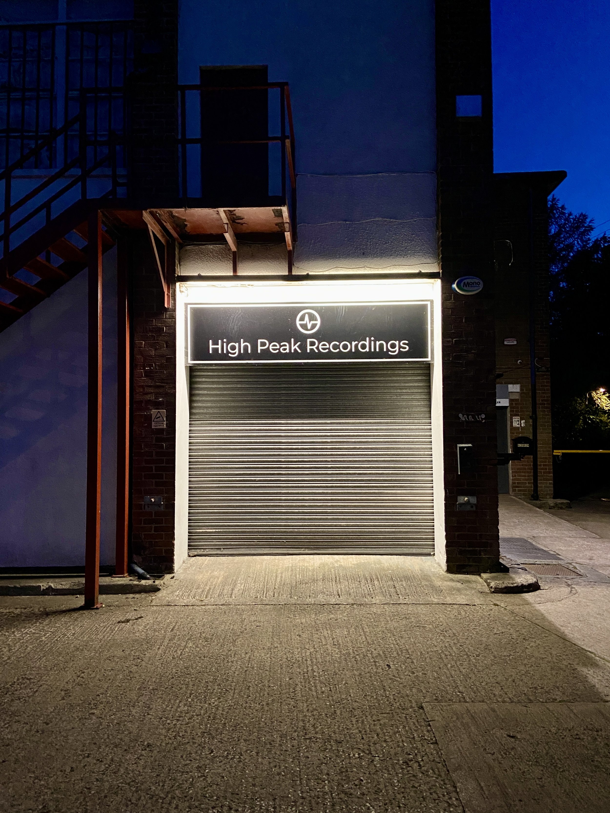 The studio entrance at night
