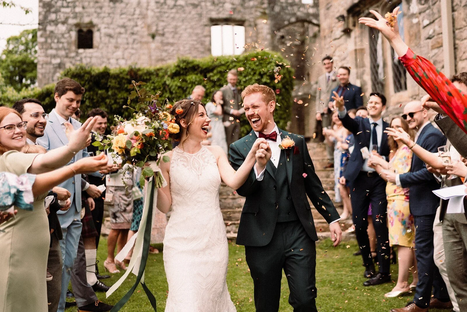 The priests house confetti moment with the bride and groom