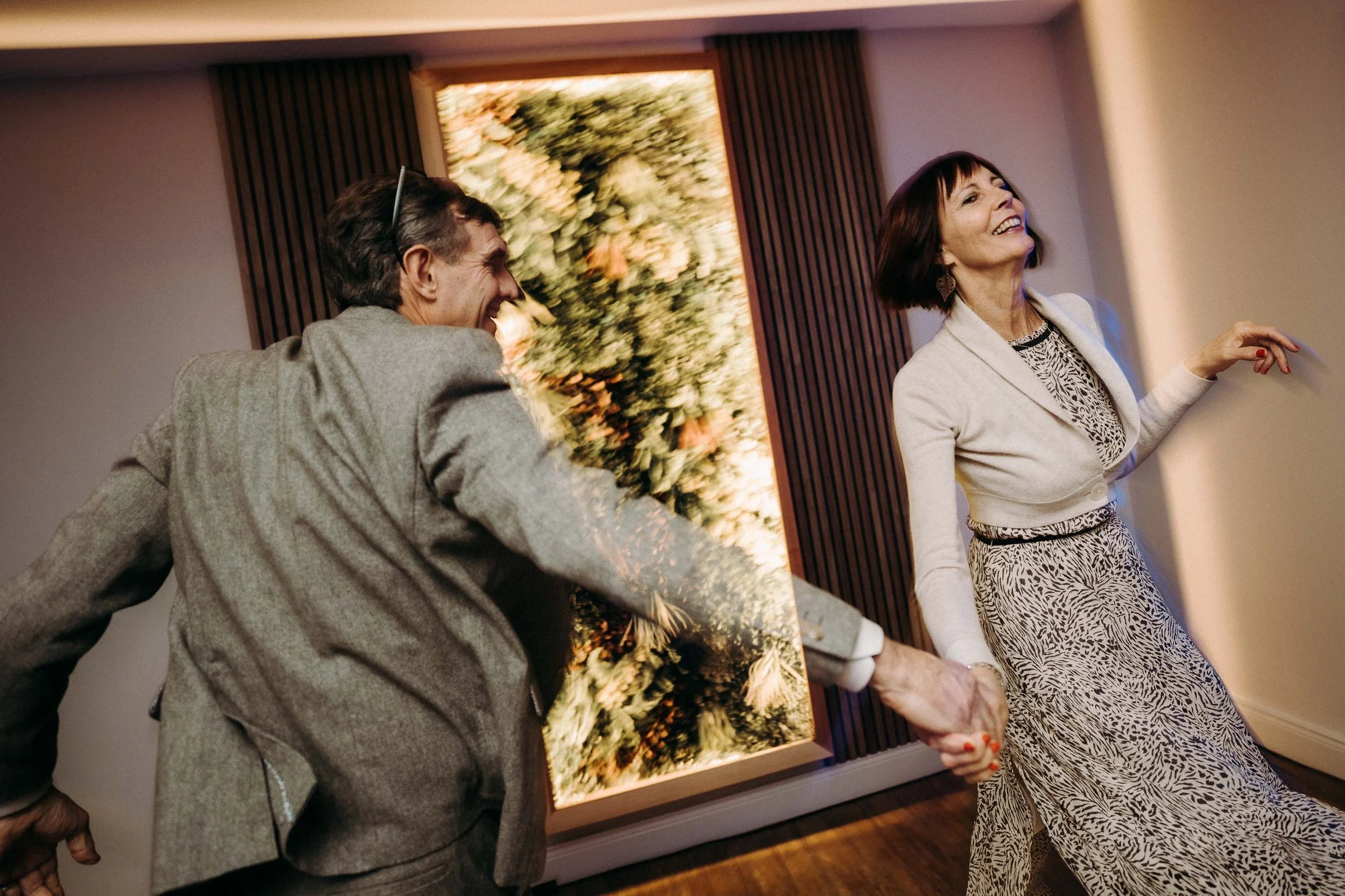 Grooms parents dance together during wedding reception at Two Woods Estate.