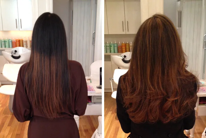 Side-by-side comparison of a woman's hair before and after a haircut and coloring at a salon. The hair on the left is straight and darker, while the hair on the right is styled with curls and appears lighter with a reddish-brown hue.