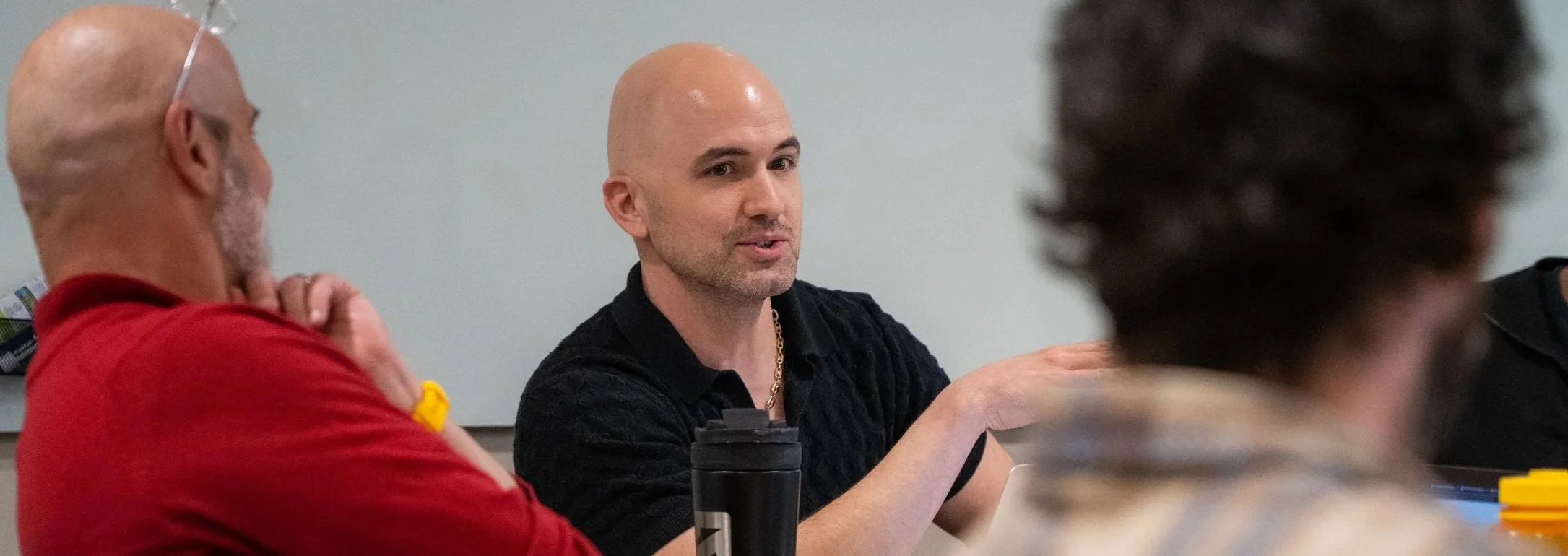 Michael at a conference table