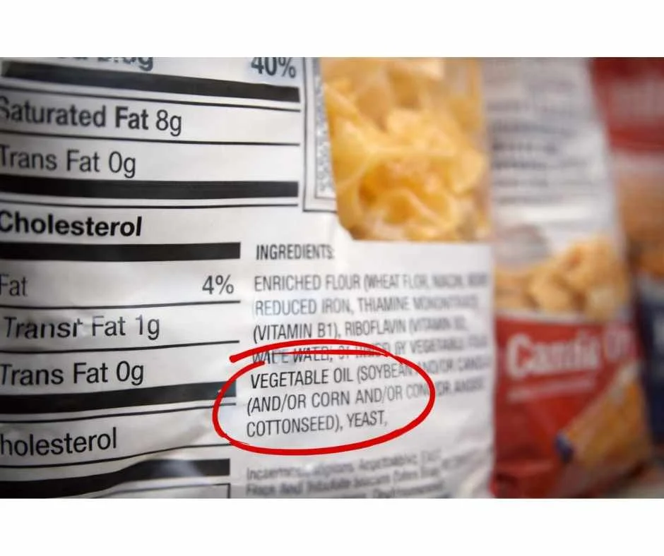 Ingredient label showing vegetable oil (soybean, corn, cottonseed) circled on a packaged food product