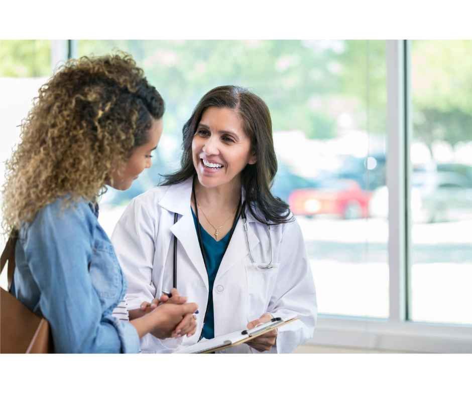 Functional medicine doctor listening to patient during consultation