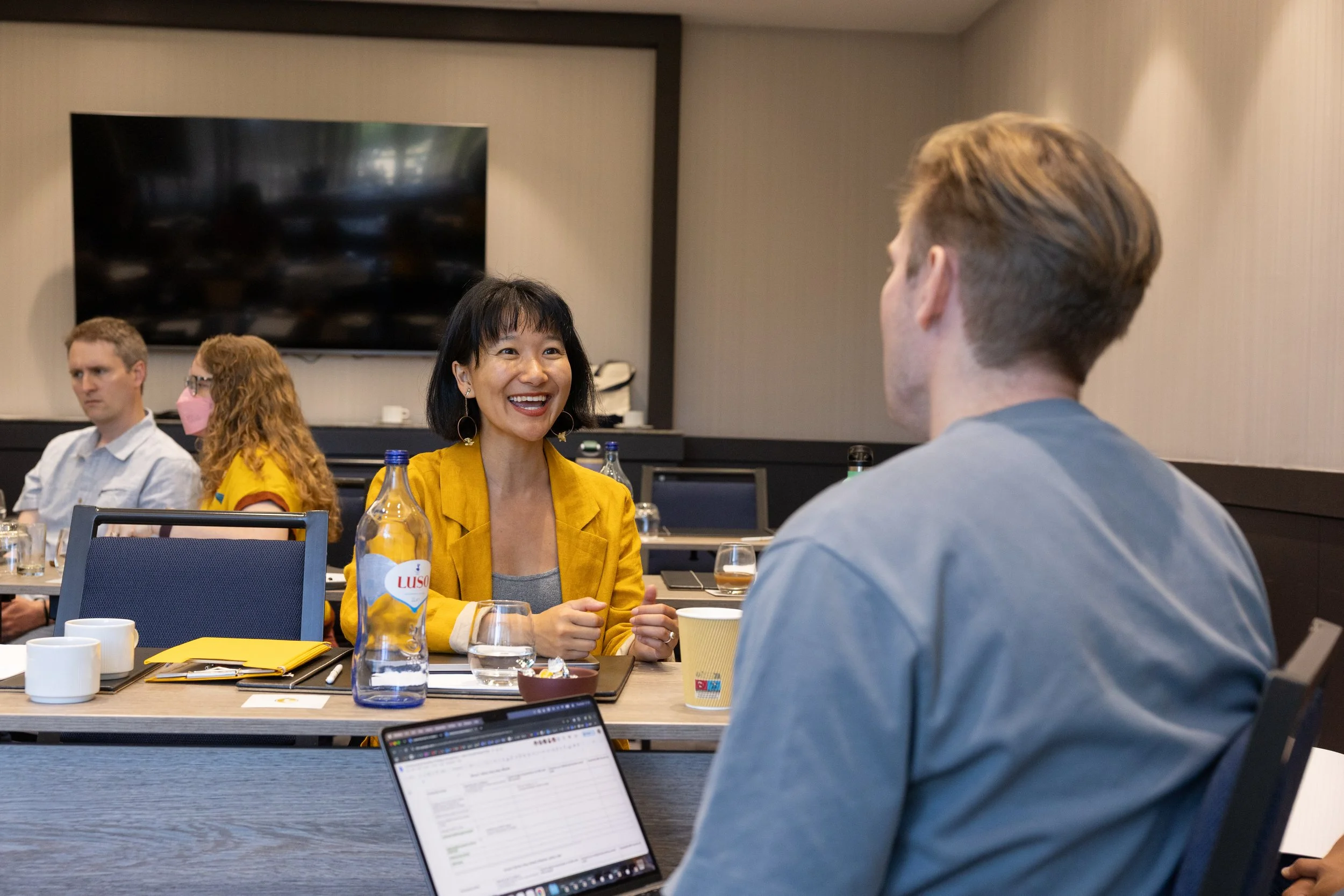 WAI board member Amy Huang talks to researcher Simon Eckerström Liedholm.