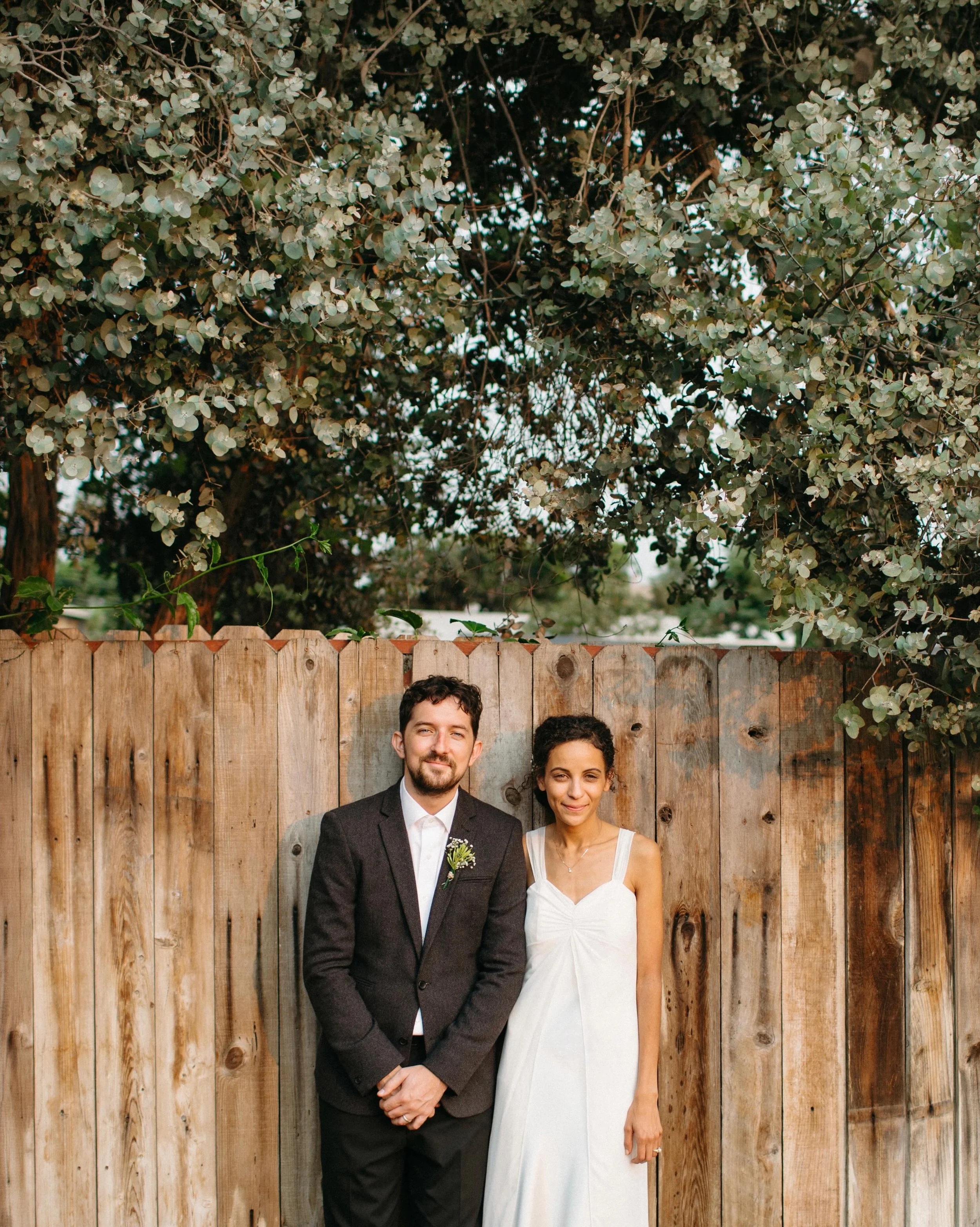 Organic garden, freeway, urban river, horse stable, apartment complex, private vows, diy details, LA flower market florals, brother&rsquo;s music, dad&rsquo;s officiating, $6 thrift store wedding dress, uncle&rsquo;s shoes, LA on fire, biodegradable 