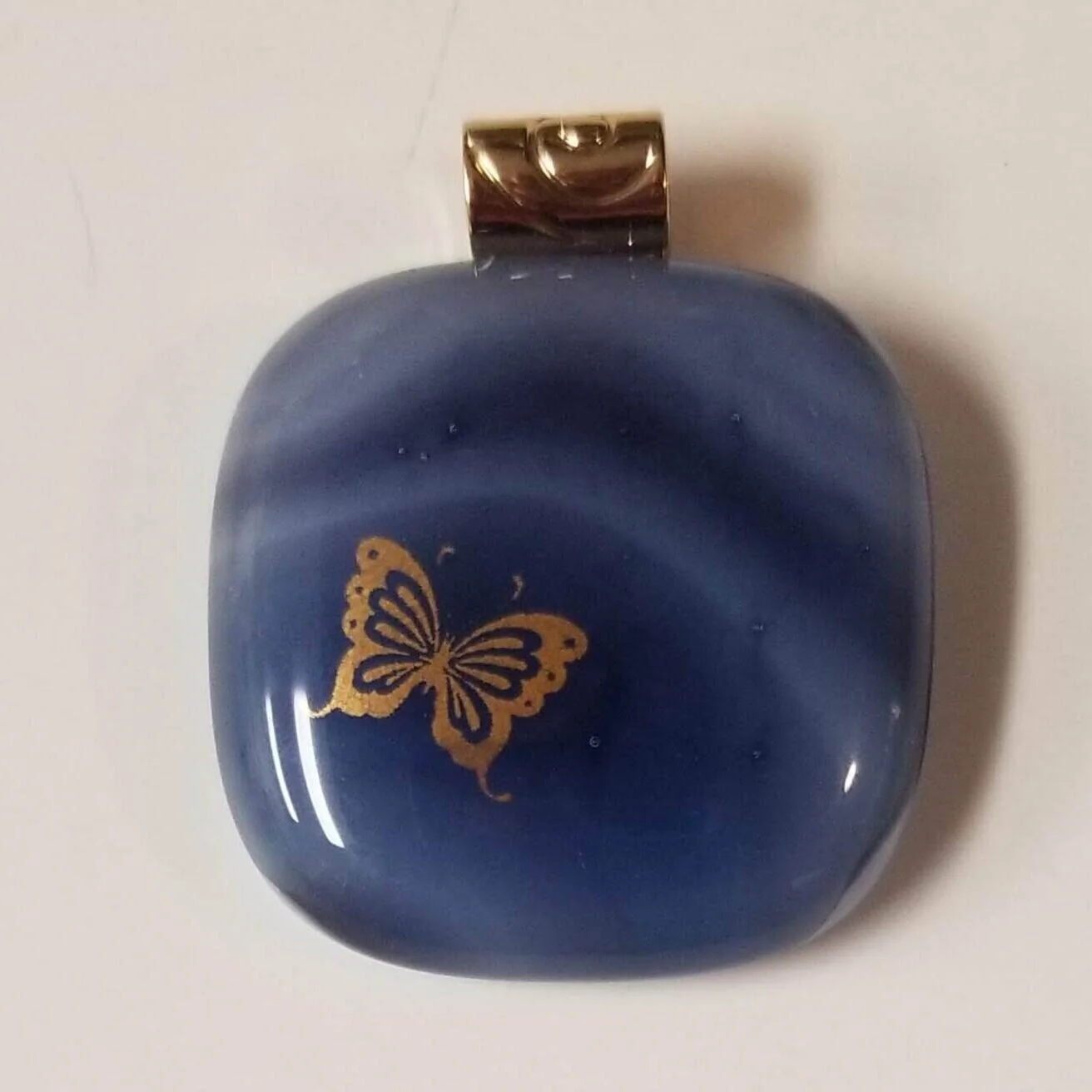 Darker purple swirls with gold butterfly pendant, $15 / $20 with cord