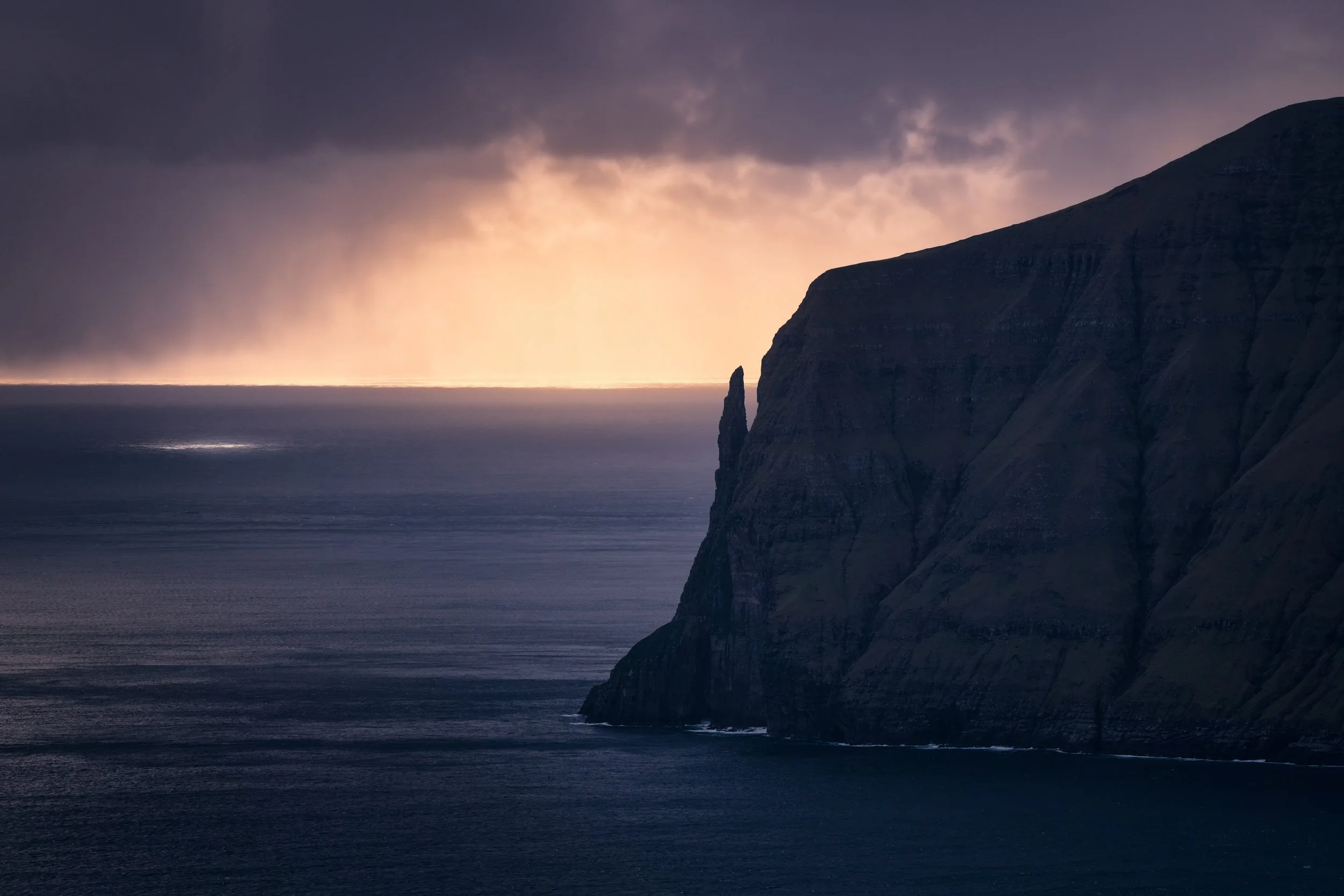 Trollkonufingur-the-whitches-finger-sunset-faroe-islands-vagar.jpg