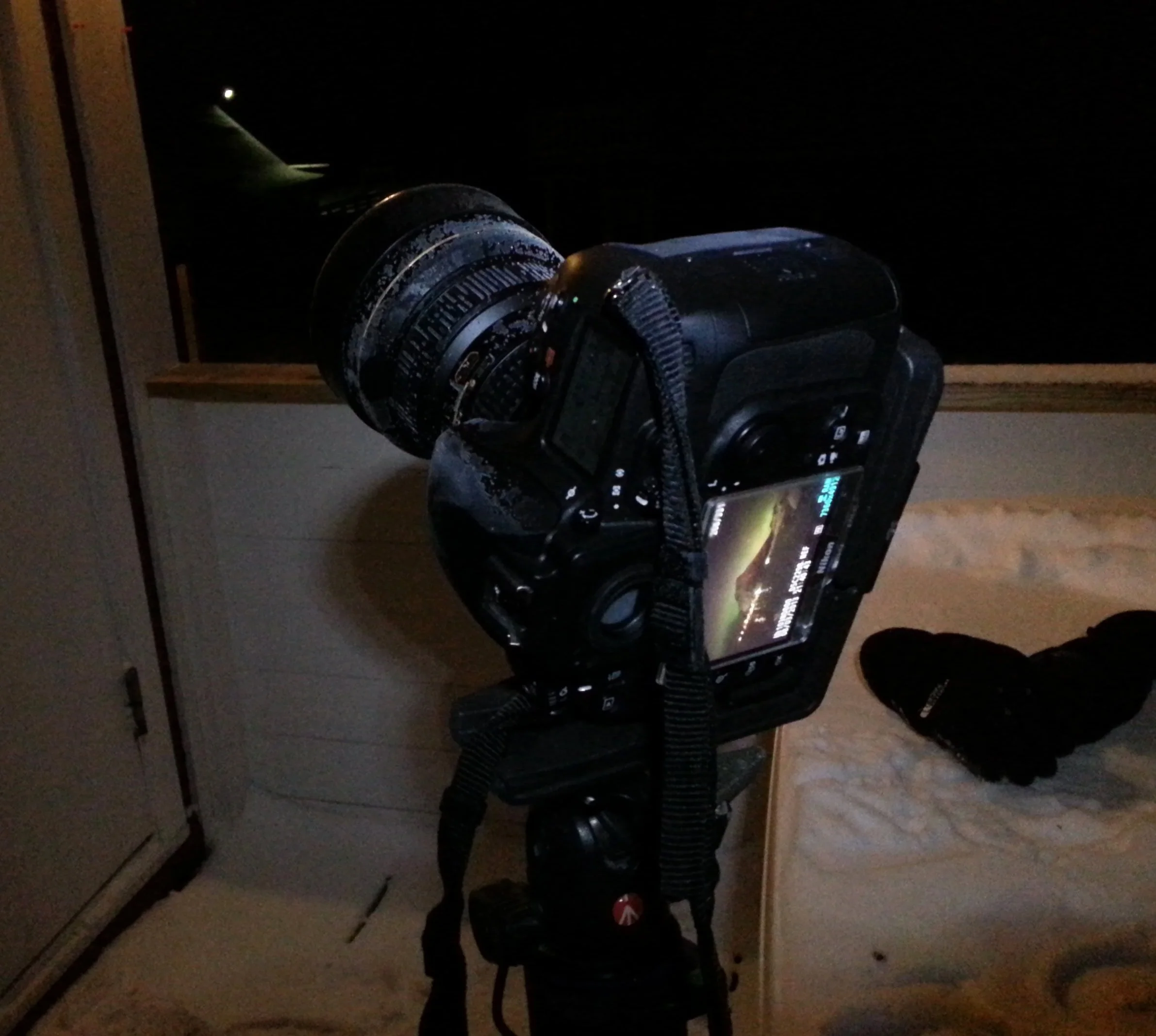 A nikon dslr frozen over after a cold Aurora borealis session on Lofoten islands. Landscape photographer Felix Inden