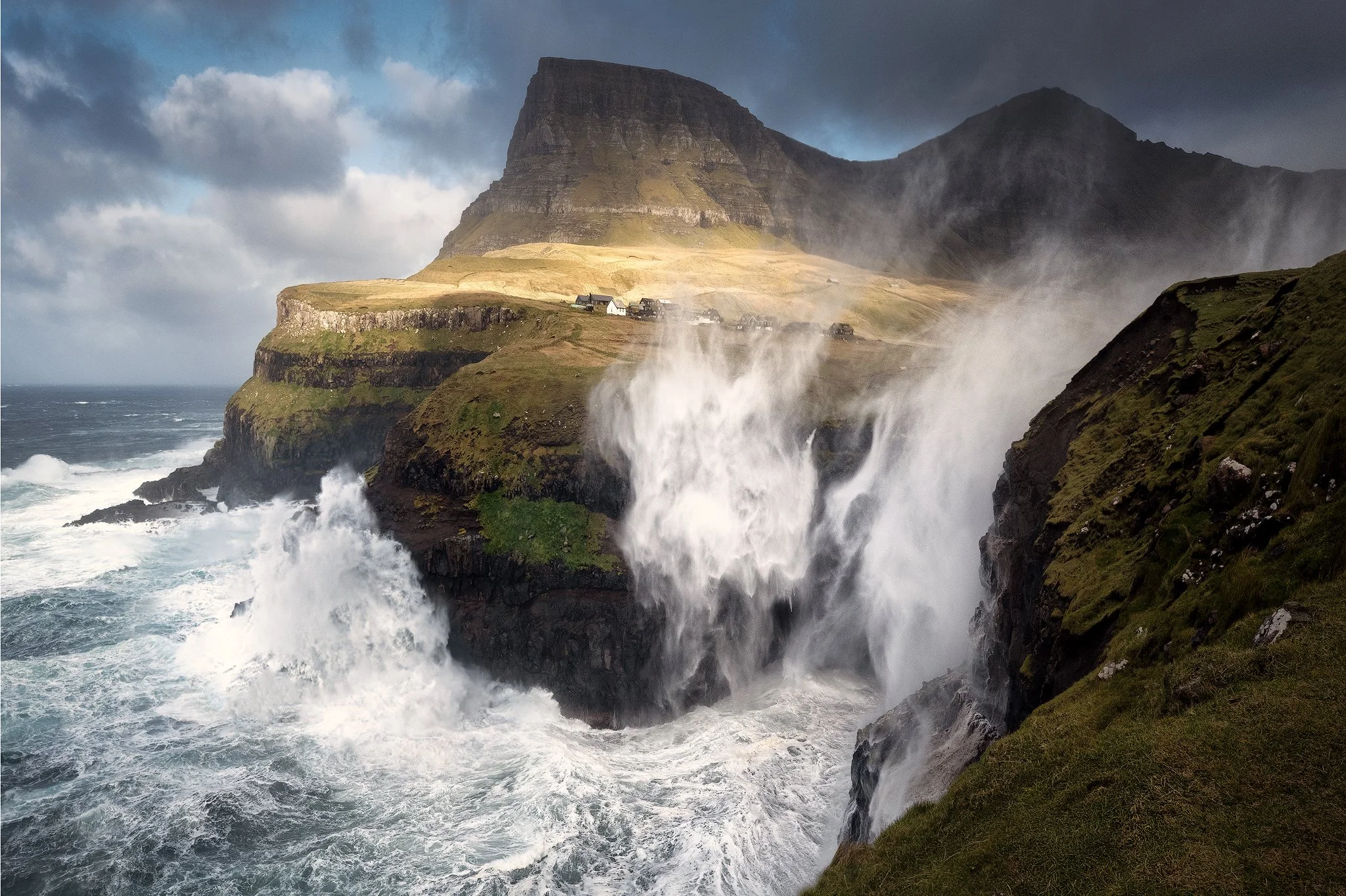 The waterfall Mulafossur on a very stormy day in Gasadalur, Faroe Islands shot on Nikon Z8 and Nikkor Z 12-24