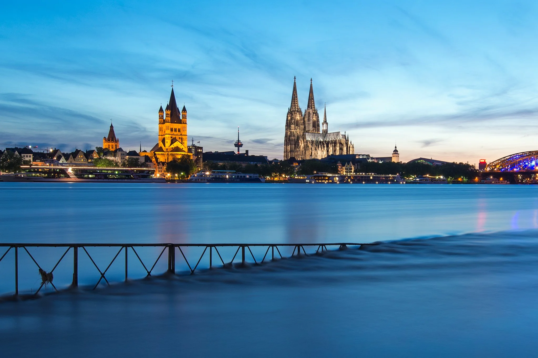 During a rare flooding, Hochwasser the Kölner Dom and Groß St. Martin throne above the area which was now turned into the Rheinboulevard in Cologne, Germany
