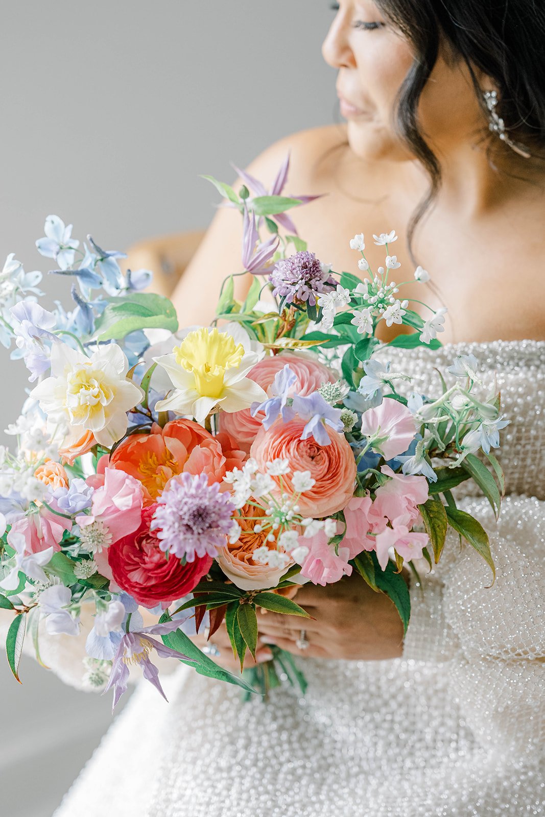 Spring wedding flowers at Bear Brook Valley in New Jersey featuring colorful floral design with peonies, daffodils, and sweet pea