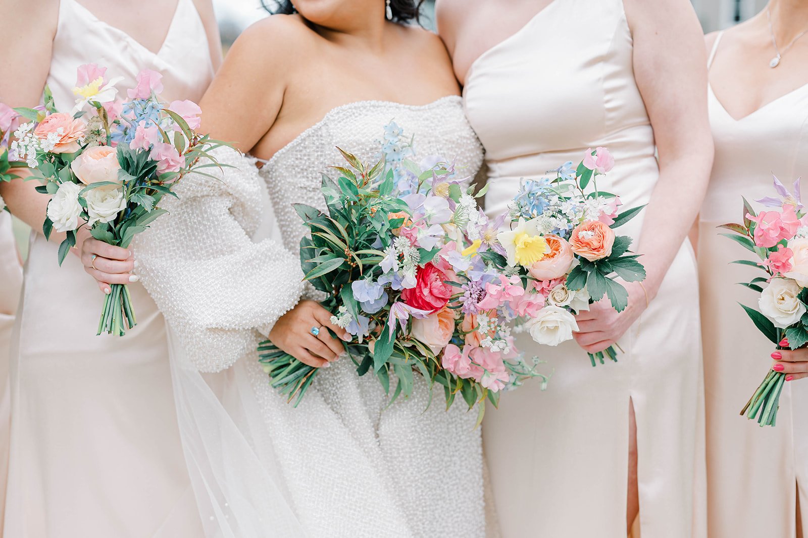 Spring wedding flowers at Bear Brook Valley in New Jersey featuring colorful floral design with peonies, daffodils, and sweet pea