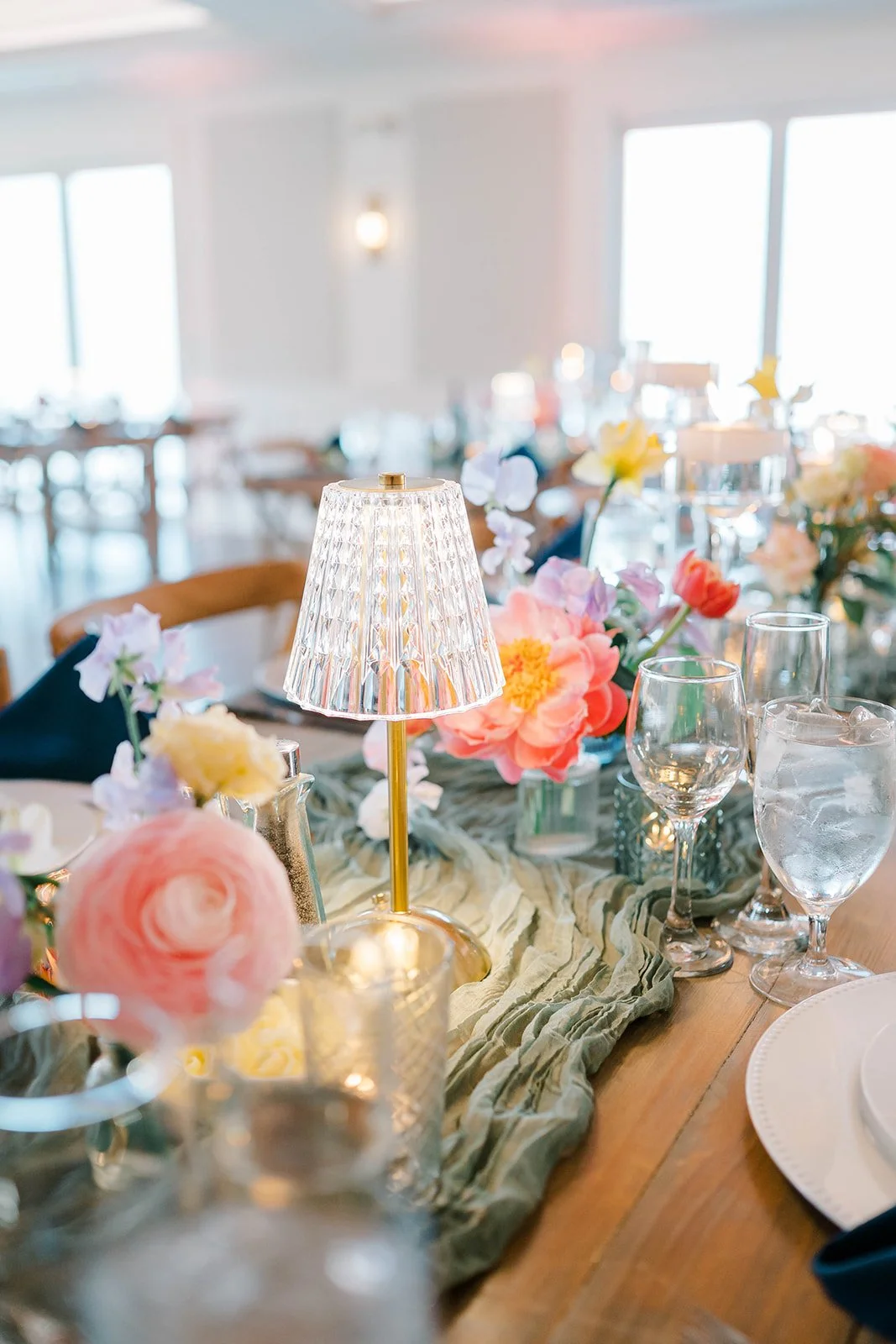 Spring wedding flowers at Bear Brook Valley in New Jersey featuring colorful floral design with peonies, daffodils, and sweet pea