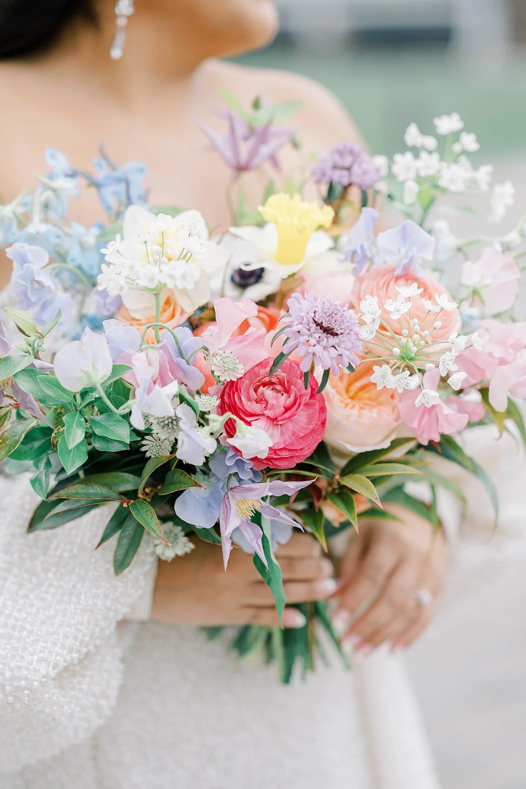 Spring wedding flowers at Bear Brook Valley in New Jersey featuring colorful floral design with peonies, daffodils, and sweet pea