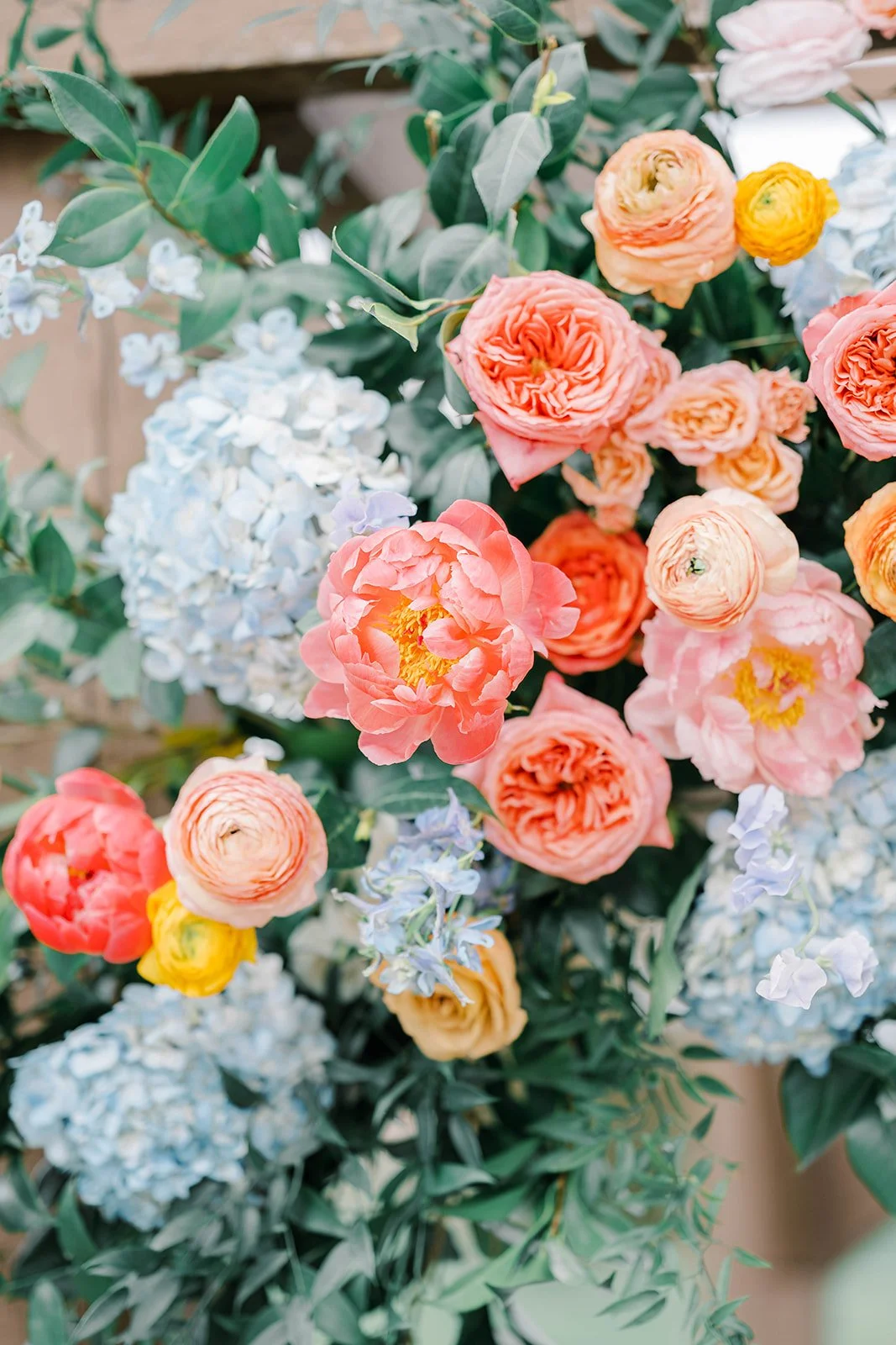 Spring wedding flowers at Bear Brook Valley in New Jersey featuring colorful floral design with peonies, daffodils, and sweet pea