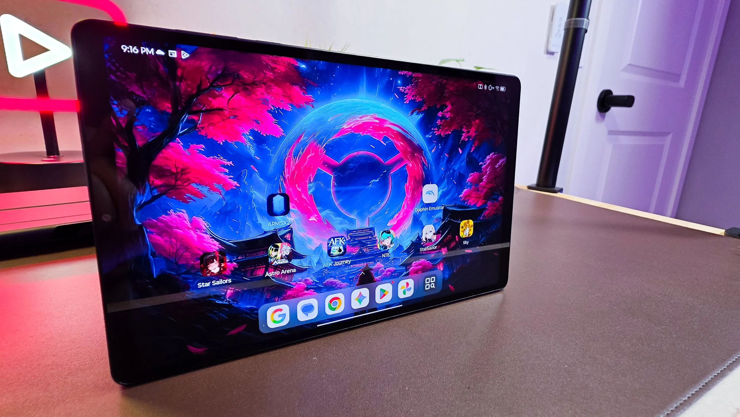 Image of the Lenovo Legion Tab Gen 5 with wallpaper on home screen in a review by The Sypnotix