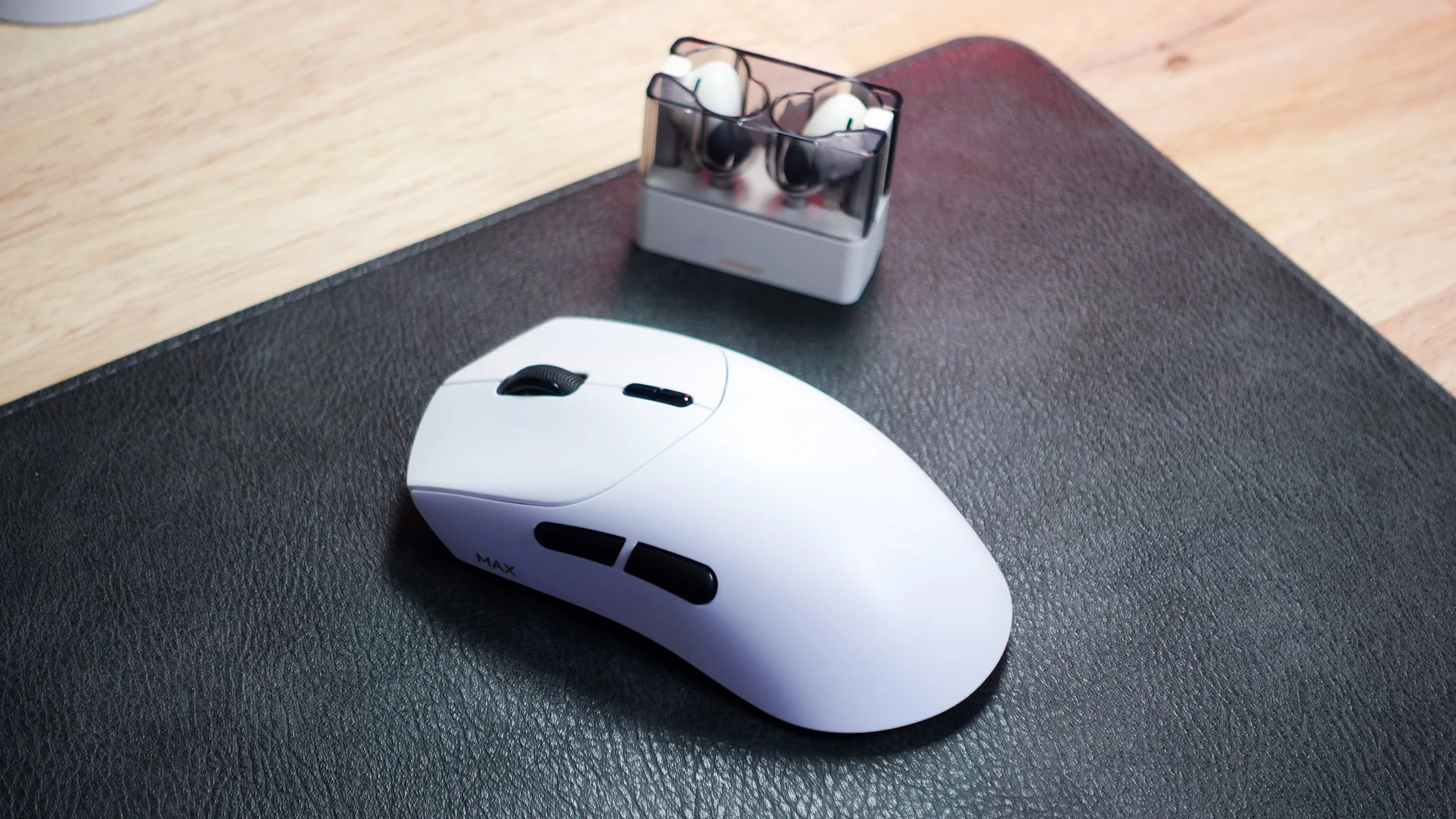An image of the Rapoo VT7 Max Gen 2 mouse in a review by The Sypnotix