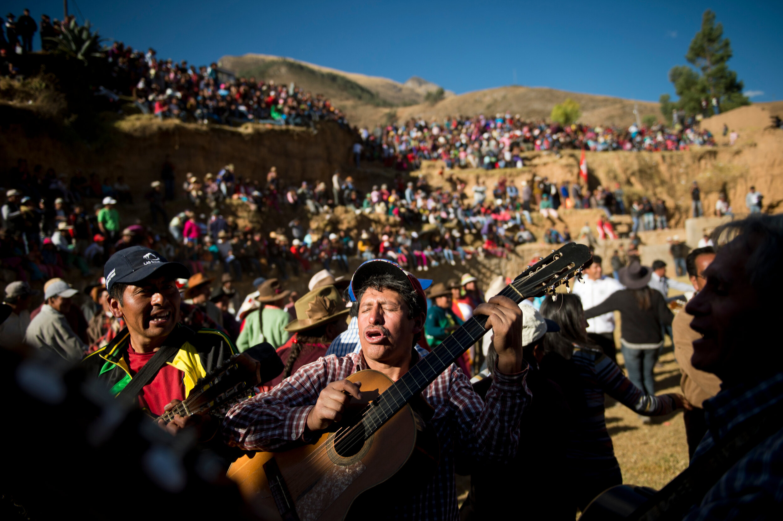  Men play the guitar and sing in Coyllurqui, in Apurimac, Peru, during the celebrations of Yawar Fiesta.  