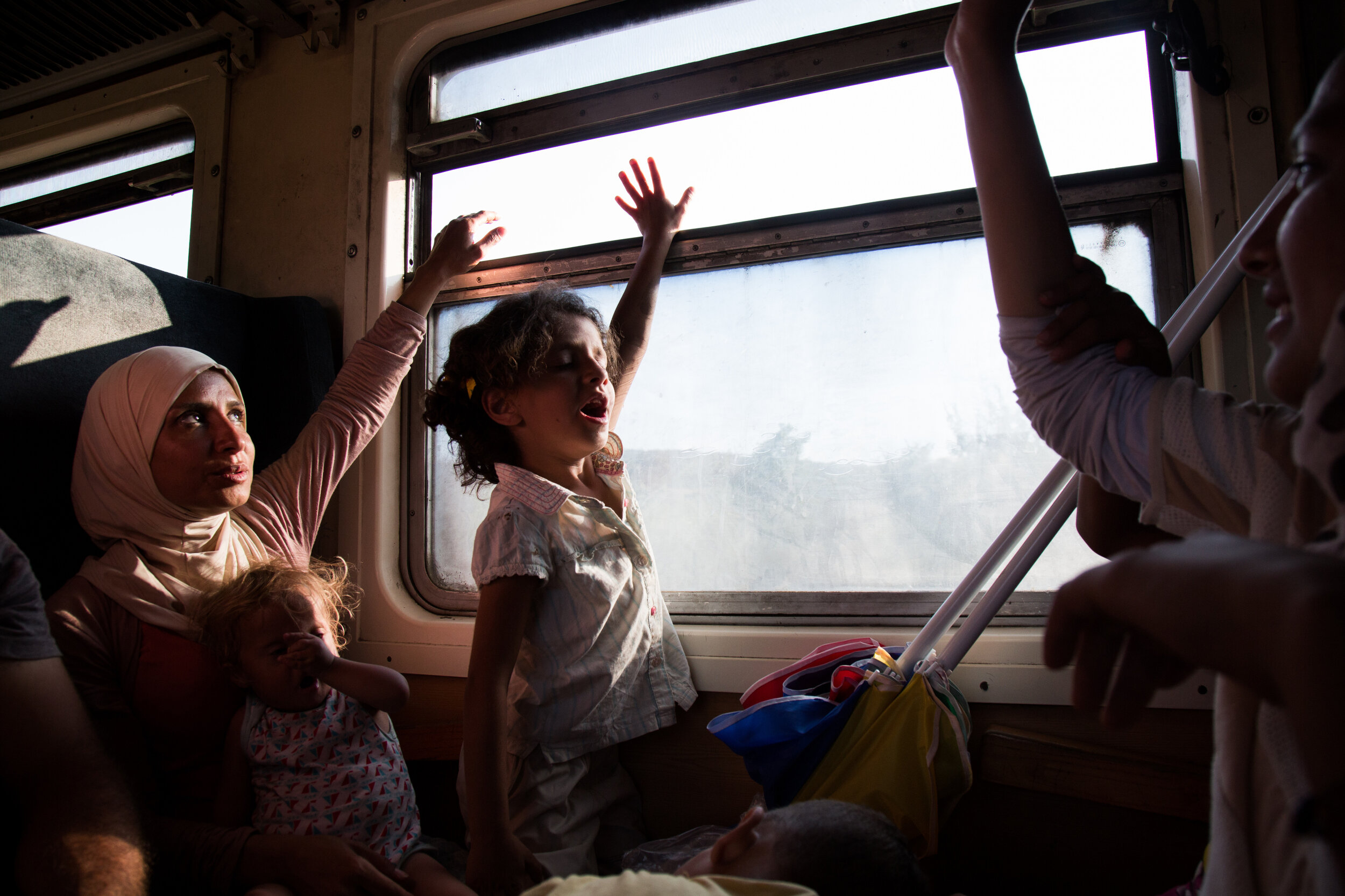  Refugees travel by train to the border with Serbia, after crossing into Macedonia on August 26, 2015. After crossing from Greece to Macedonia, they receive a document allowing them 72 hours to apply for asylum or leave the country. Most continue nor