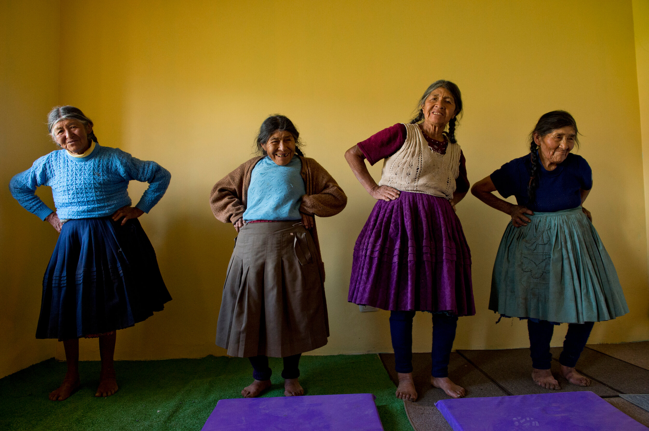  Women attend a physical therapy session in the town of Chara, in Cusco, Peru. 