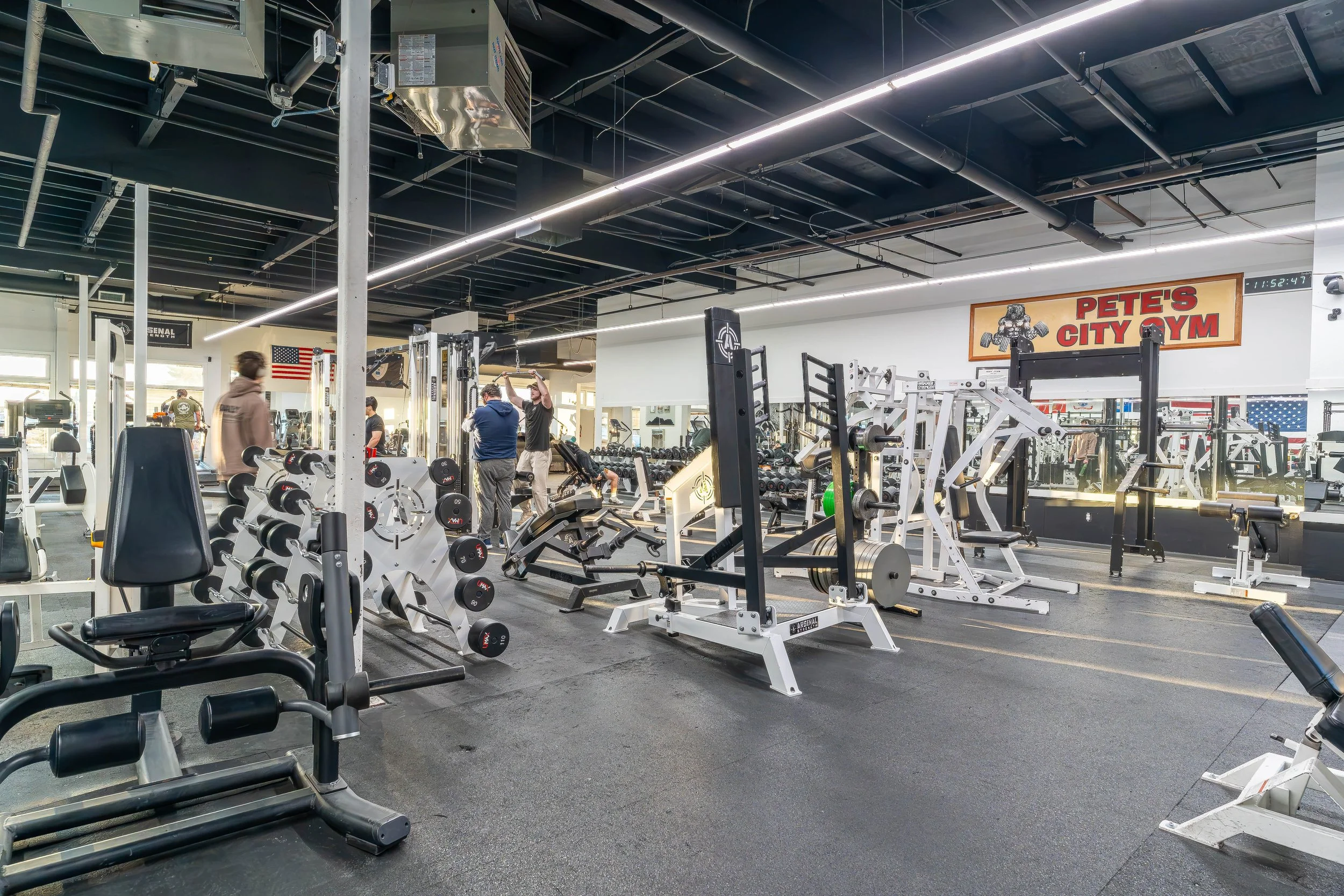 Strength training machines and free weight area at Southside Strength and Fitness strength gym in Anchorage, Alaska