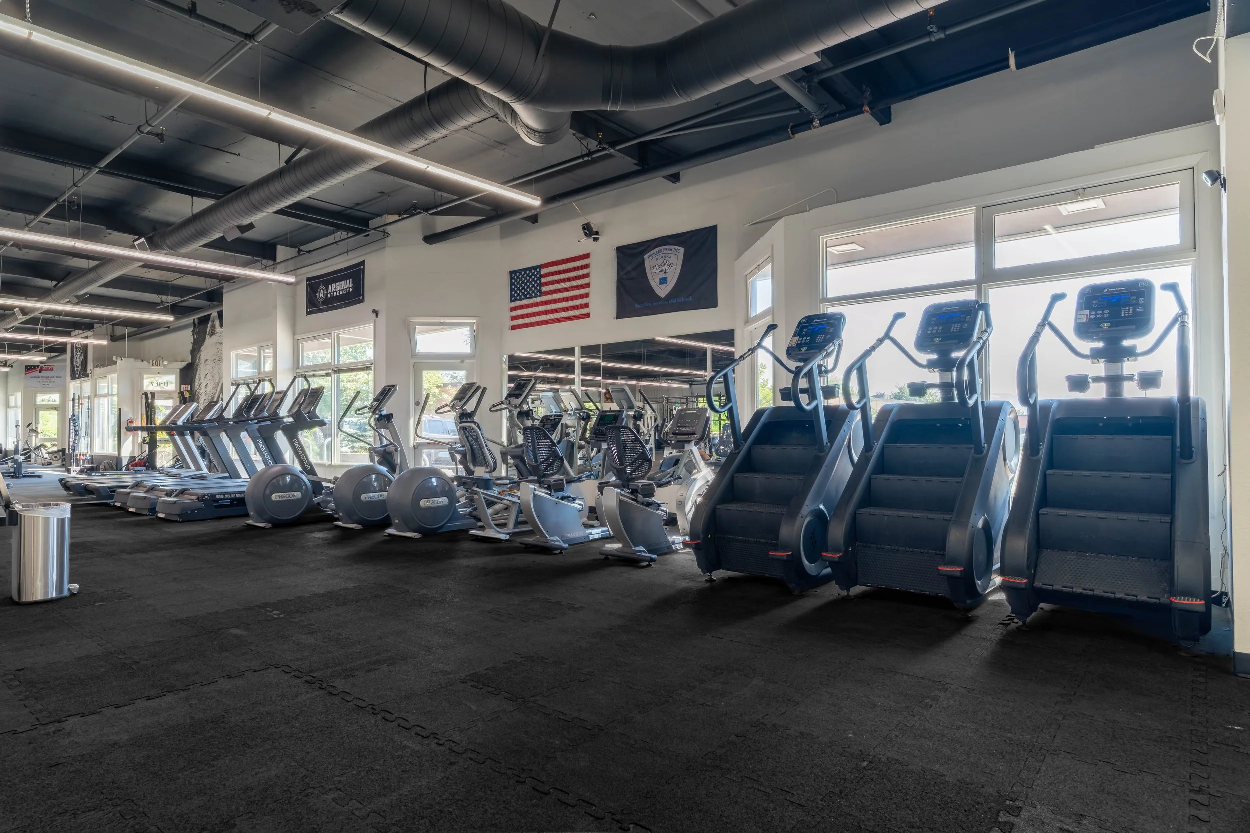 Cardio area with StairMasters and treadmills at Southside Strength and Fitness in Anchorage, Alaska