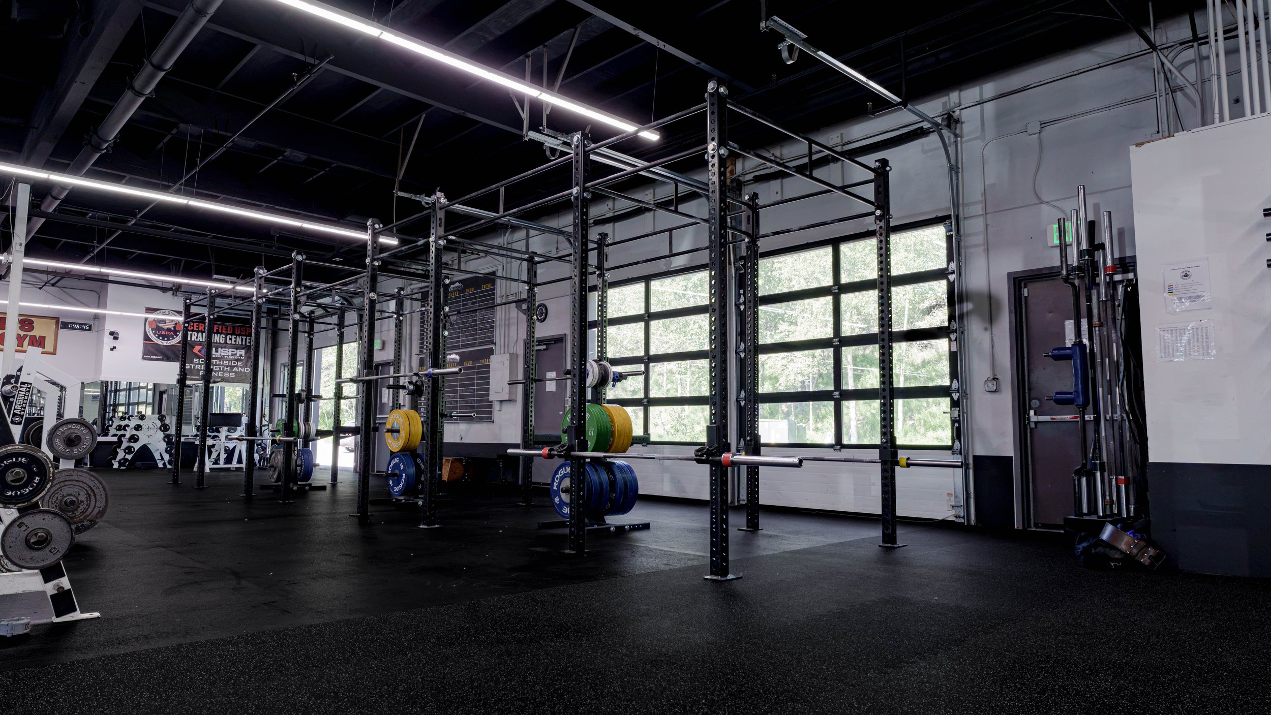 Squat racks and barbell training area at Southside Strength and Fitness in Anchorage, Alaska