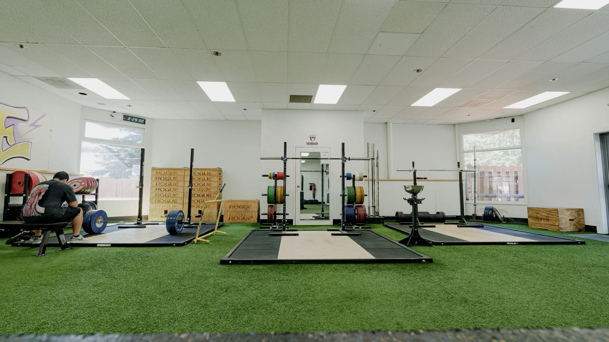 Olympic lifting platforms and bumper plate training area at Southside Strength and Fitness in Anchorage, Alaska