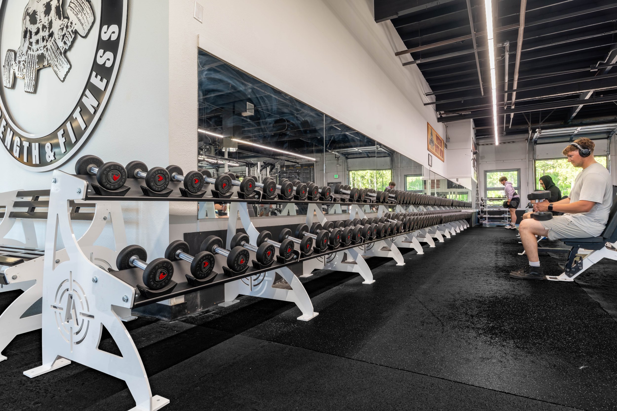 Free weight dumbbell area for strength training at Southside Strength and Fitness in Anchorage, Alaska